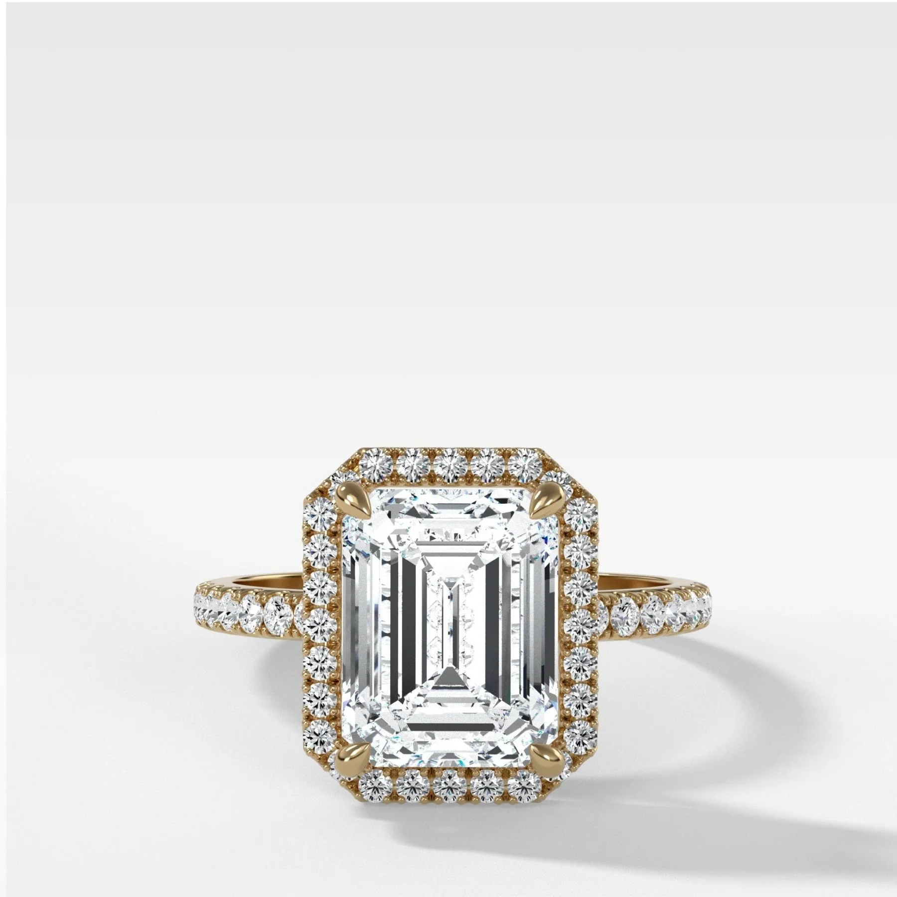 Aurora Pavé Halo Ring With Emerald Cut
