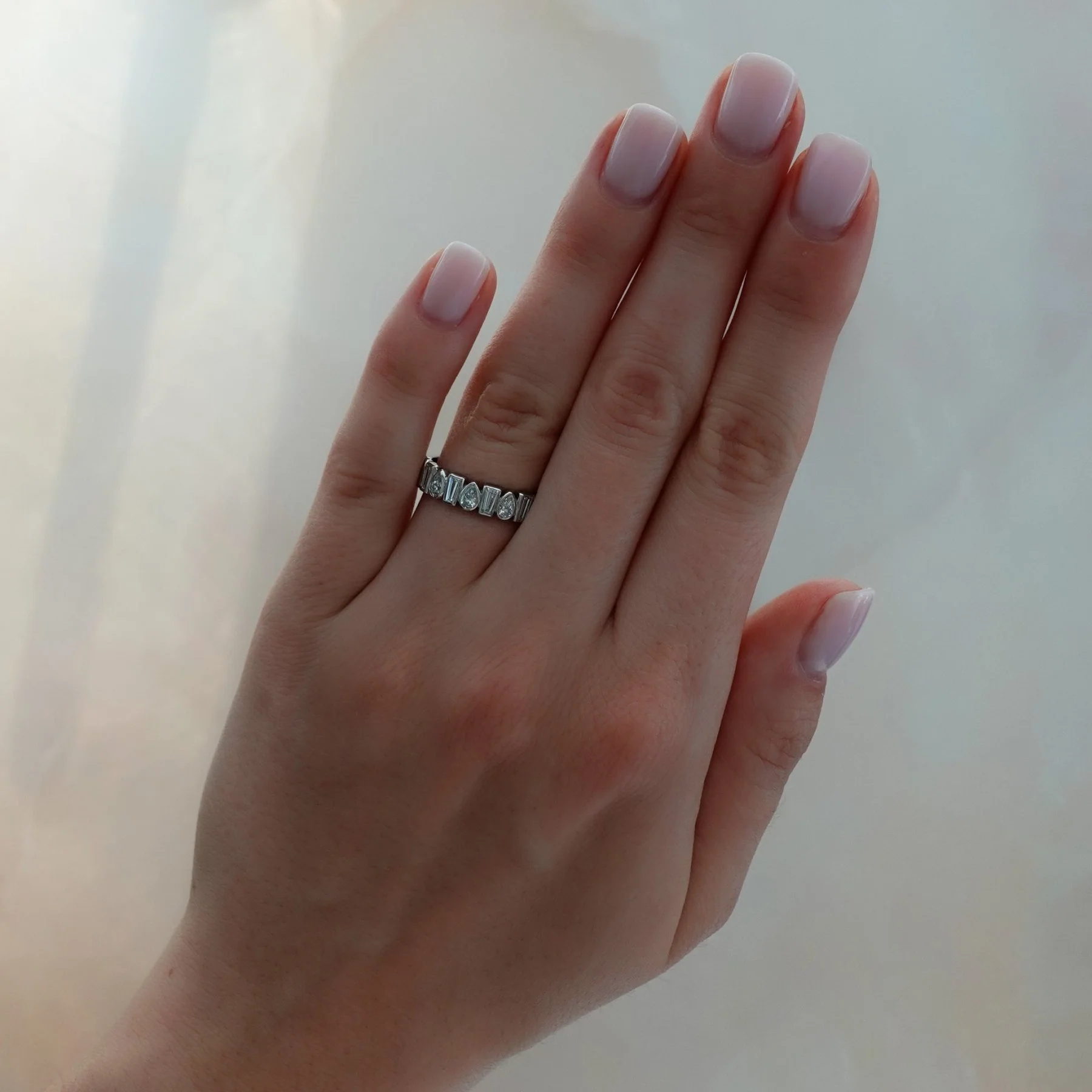 Baby Bezel Set Eternity Band with Pear and Tapered Baguette Diamonds - Image 2