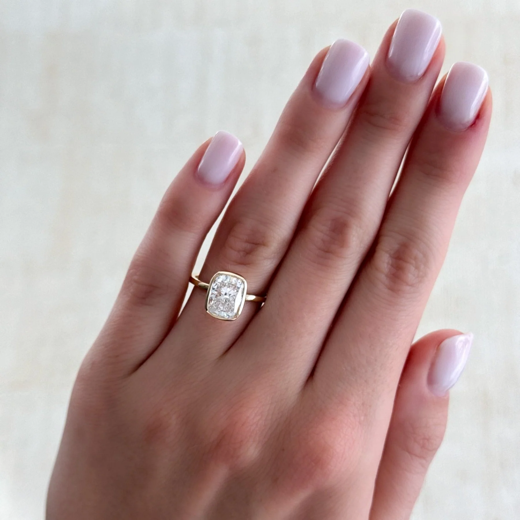 Penumbra Bezel Set Engagement Ring With Elongated Cushion Cut - Image 5