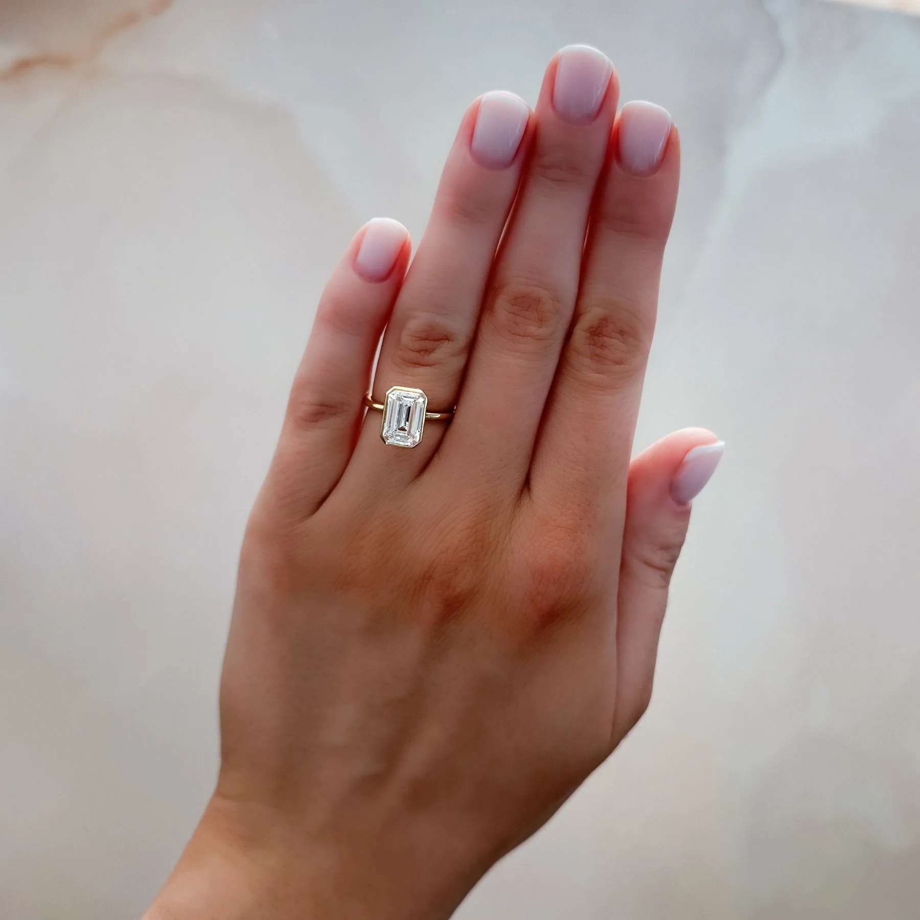 Penumbra Bezel Set Engagement Ring With Emerald Cut - Image 7
