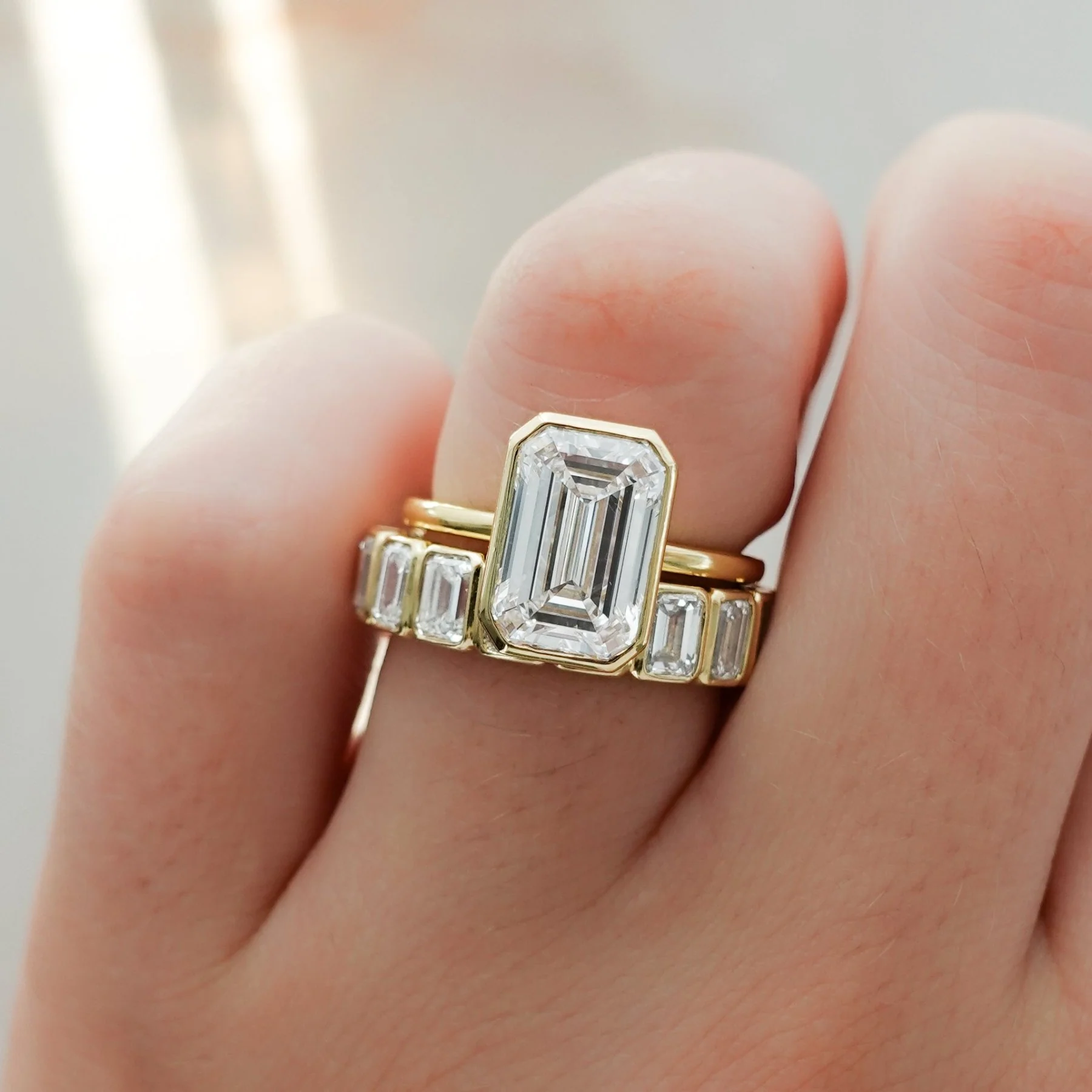 Penumbra Bezel Set Engagement Ring With Emerald Cut - Image 8