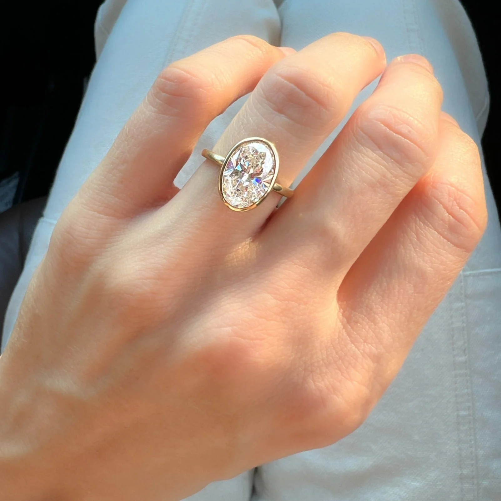 Penumbra Bezel Set Engagement Ring With Oval Cut - Image 11