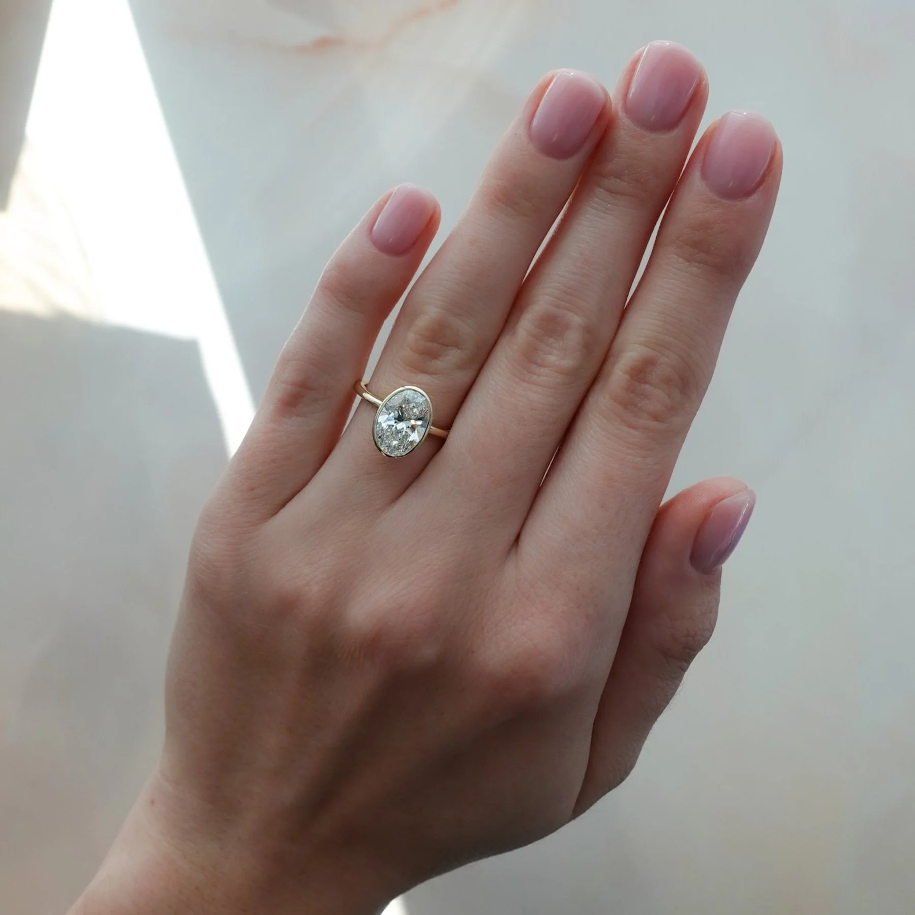 Penumbra Bezel Set Engagement Ring With Oval Cut - Image 5