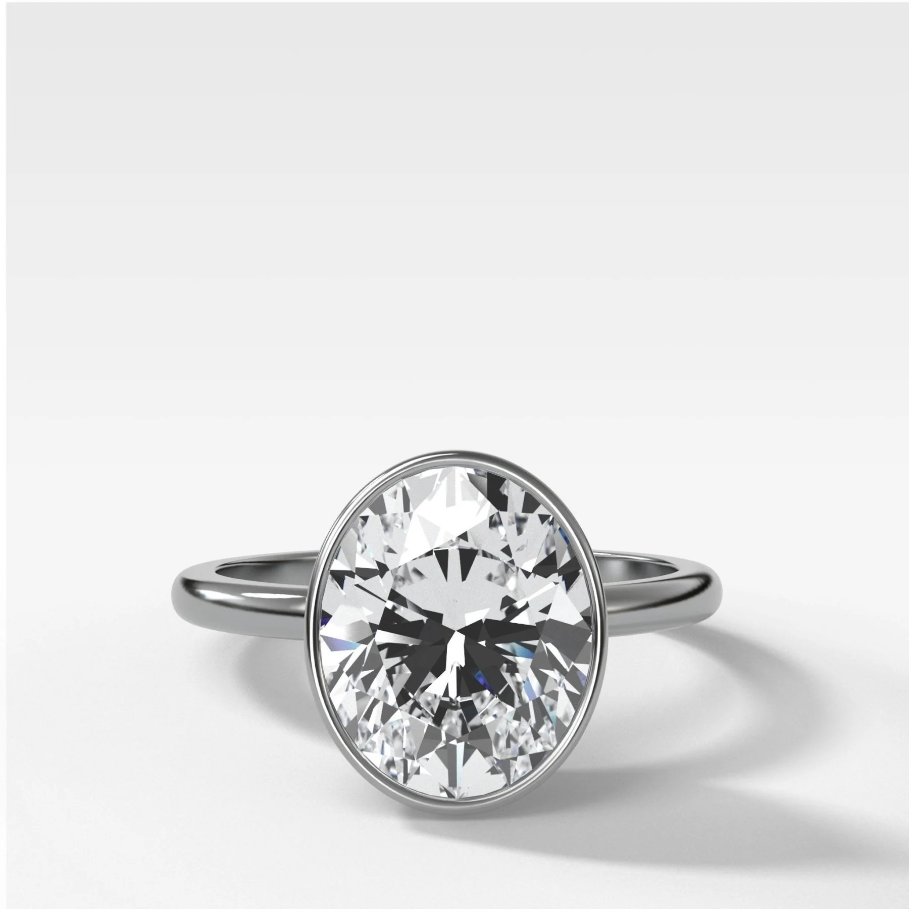 Penumbra Bezel Set Engagement Ring With Oval Cut - Image 7