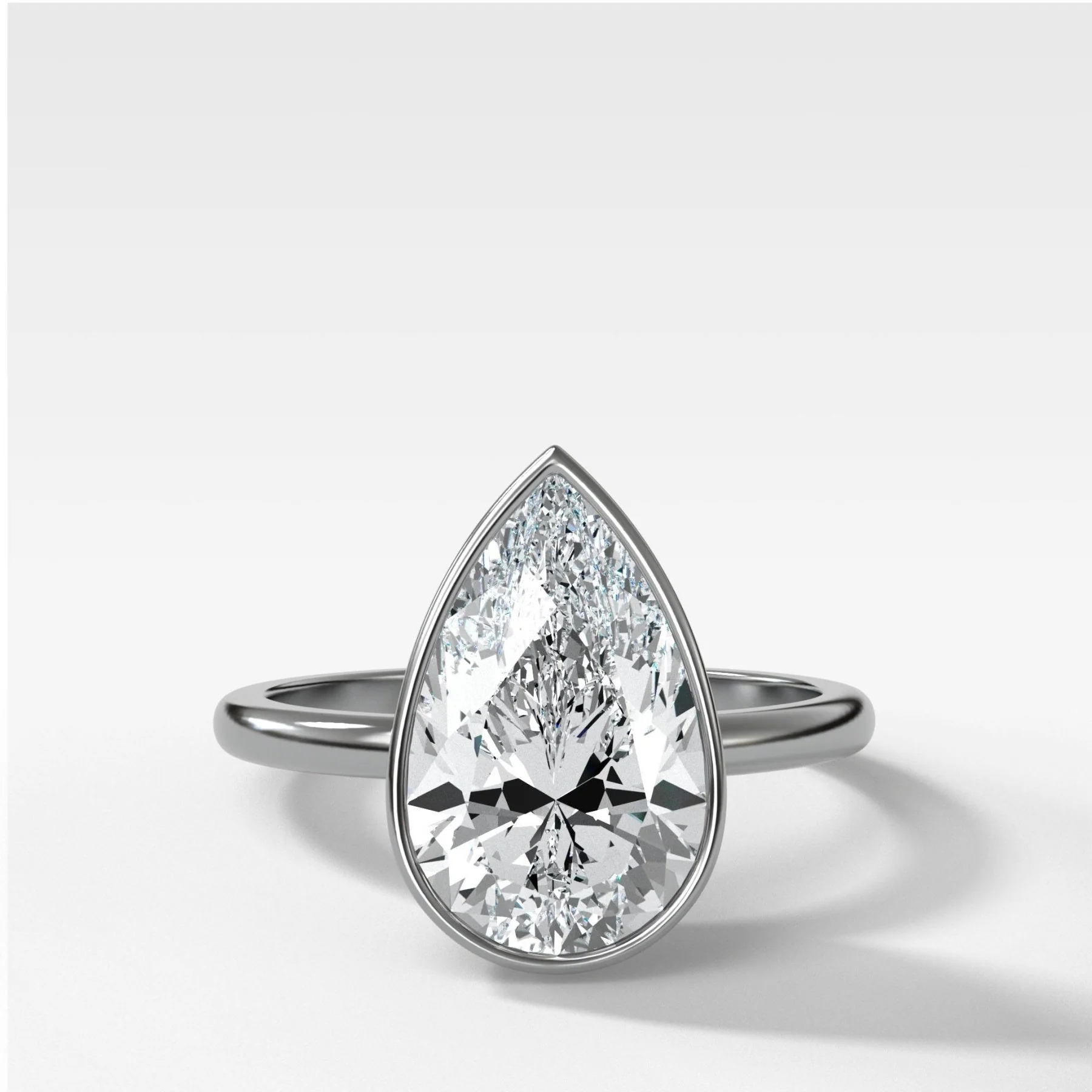 Penumbra Bezel Set Engagement Ring With Pear Cut - Image 4