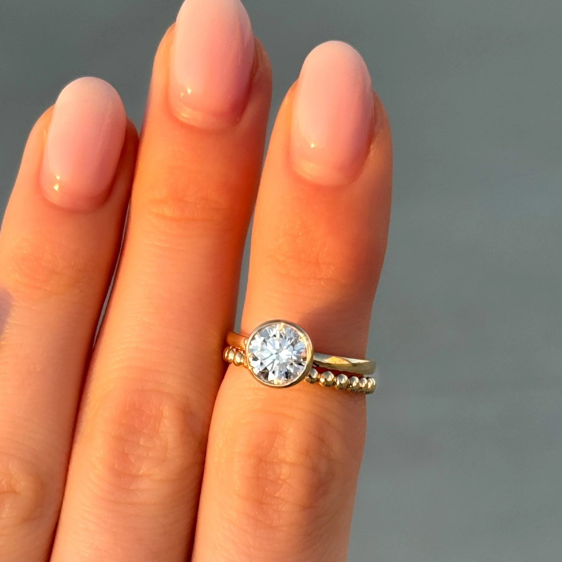 Penumbra Bezel Set Engagement Ring With Round Cut - Image 6