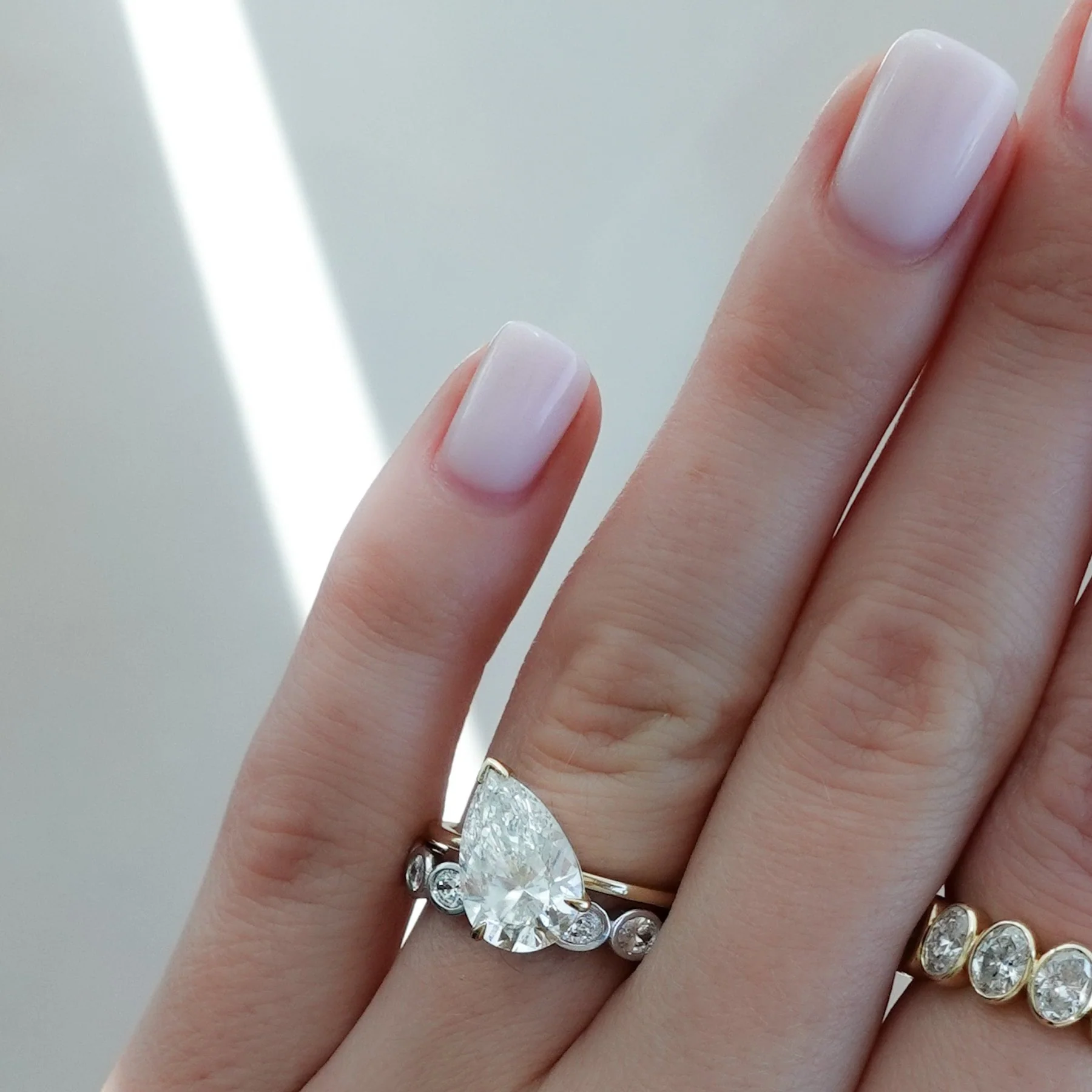 Baby Bezel Set Eternity Band With East West Oval Cuts - Image 8