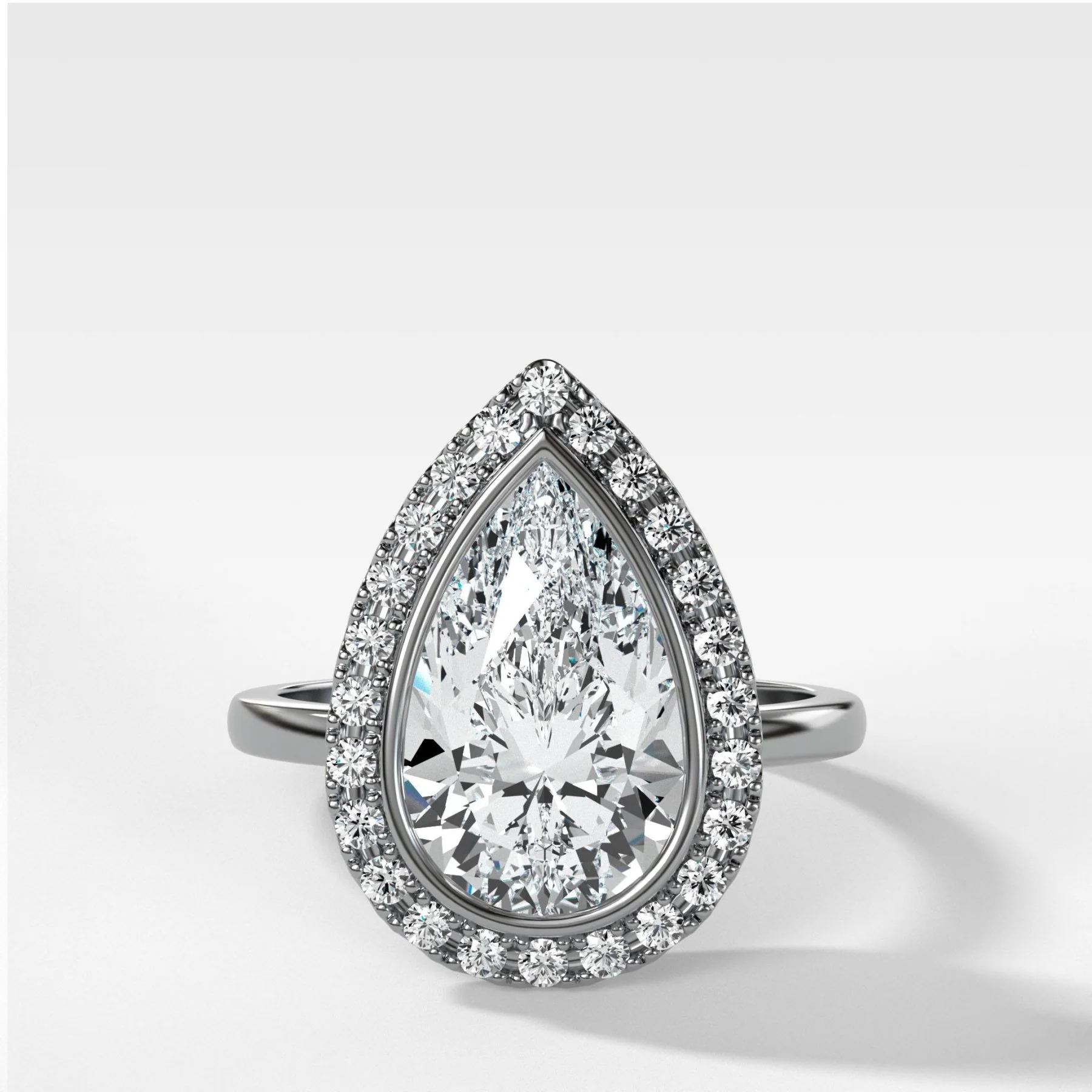Bezel Set Halo Engagement Ring With Pear Cut Diamond - Image 4