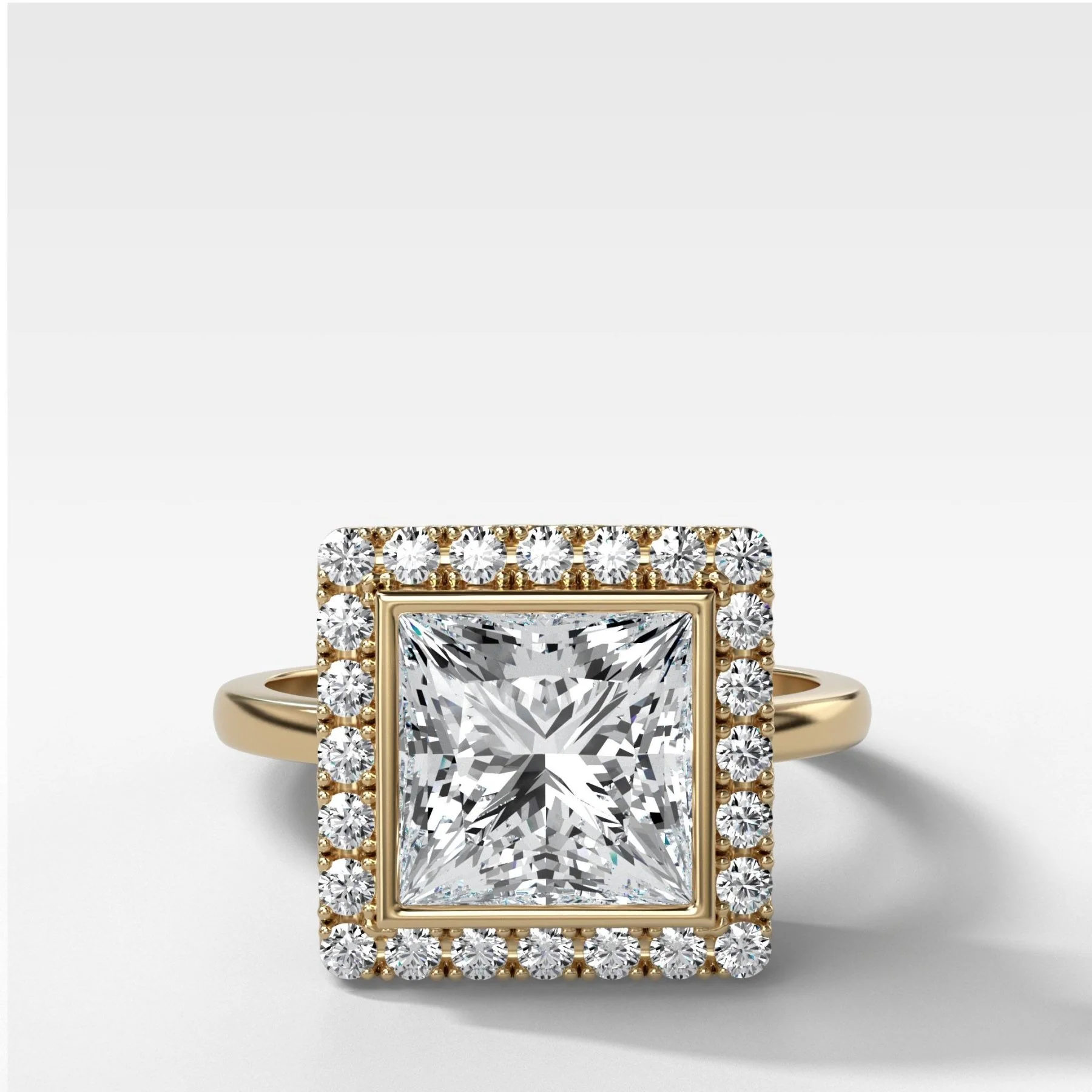 Bezel Set Halo Engagement Ring With Princess Cut Diamond