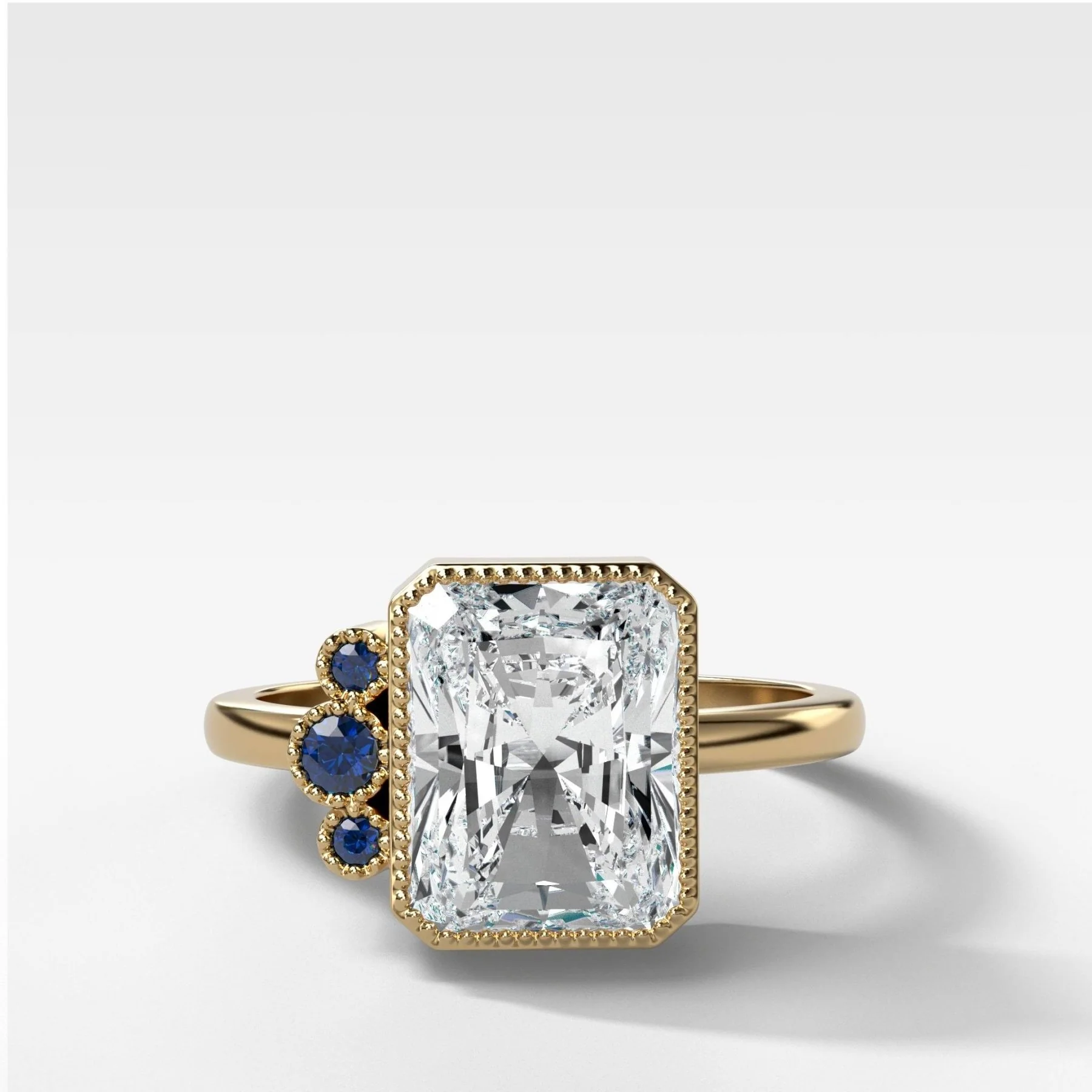 Blue Sapphire Cluster Engagement Ring With Elongated Radiant Cut