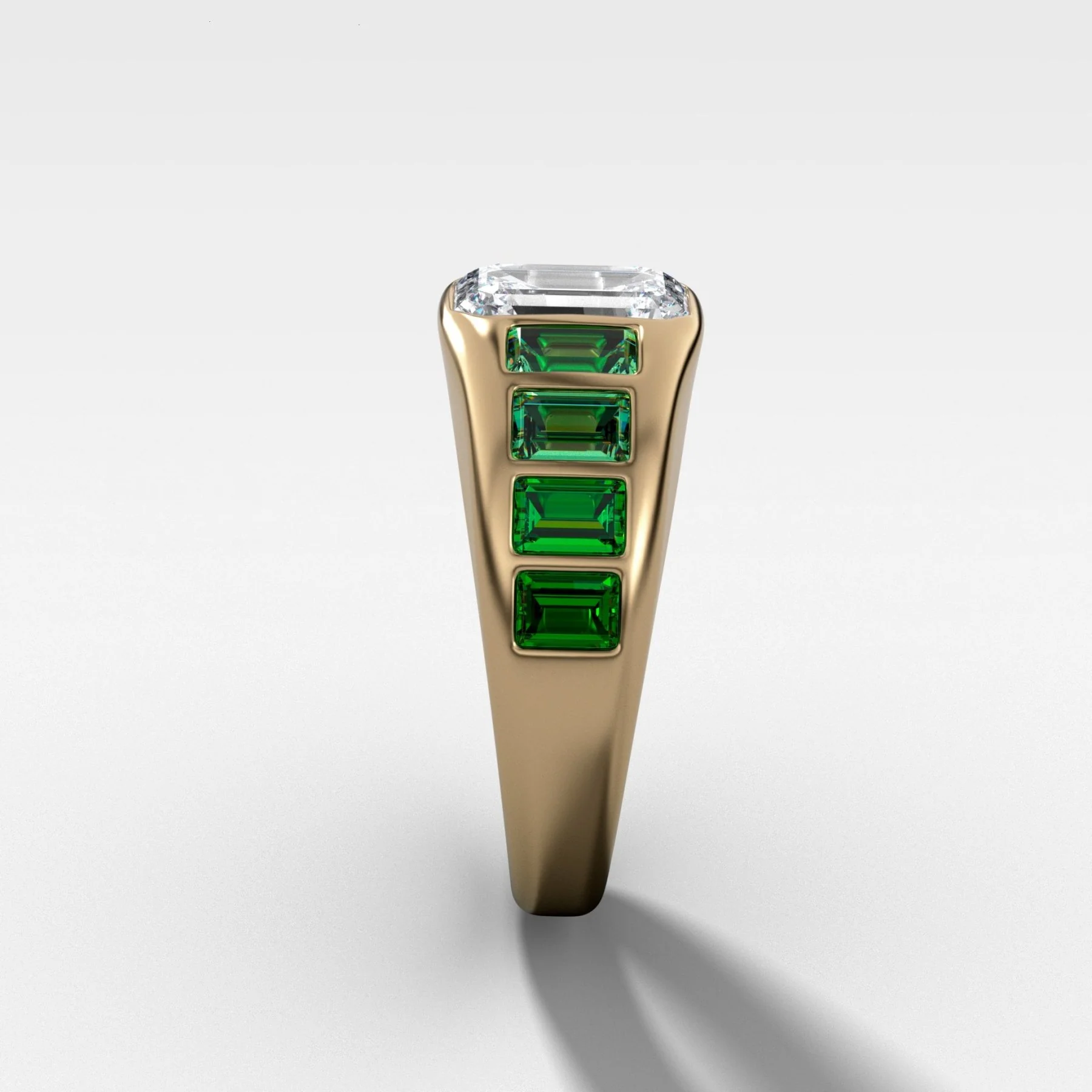 Brick Road Engagement Ring with Green Emeralds and an Emerald Cut - Image 2