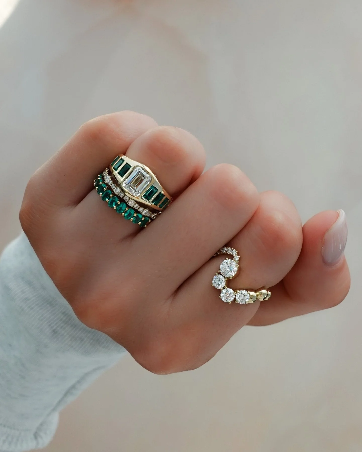 Brick Road Engagement Ring with Green Emeralds and an Emerald Cut - Image 7