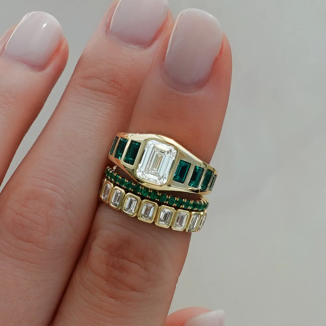Brick Road Engagement Ring with Green Emeralds and an Emerald Cut - Image 8