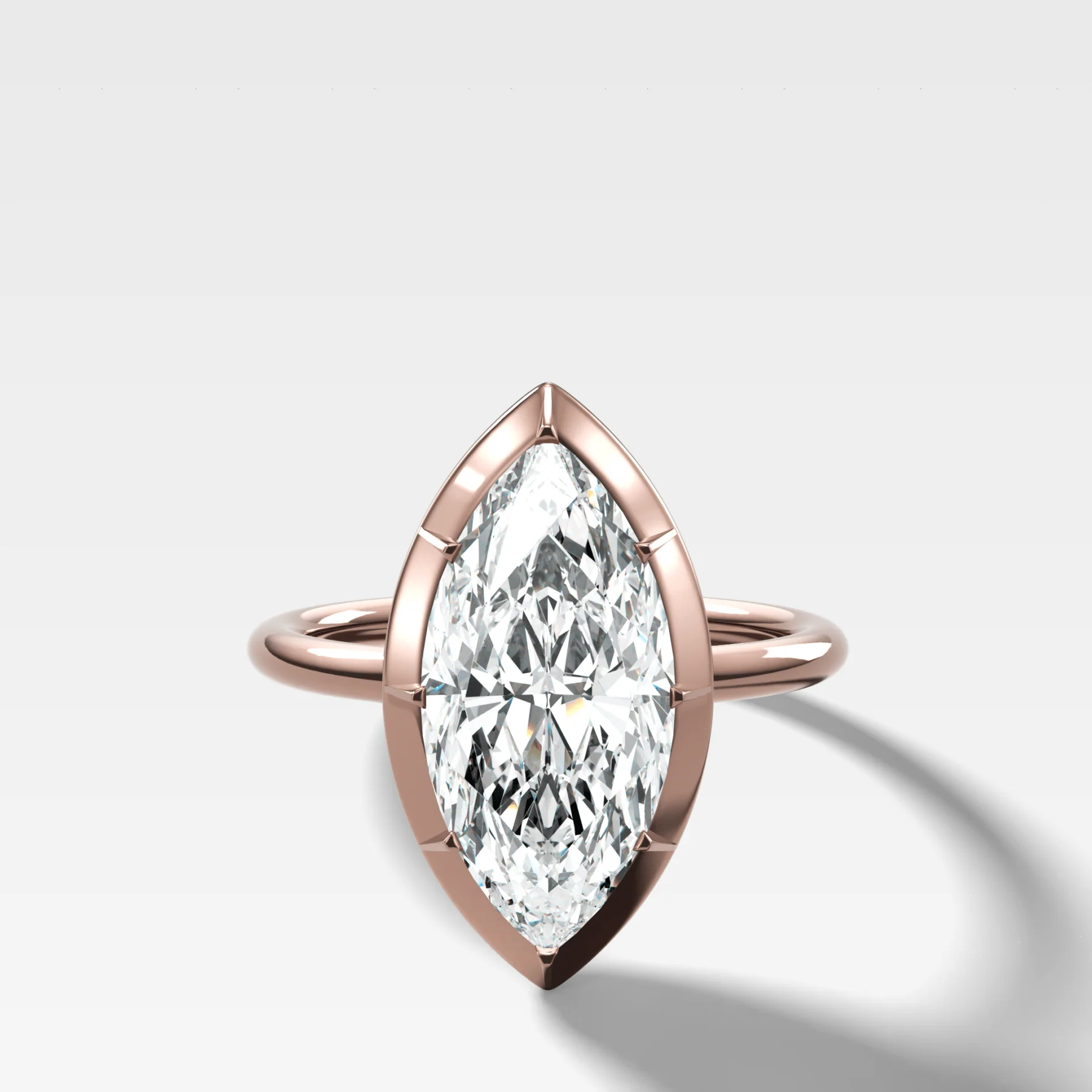 Button Back Solitaire Engagement Ring With a Marquise Cut Diamond - Image 4