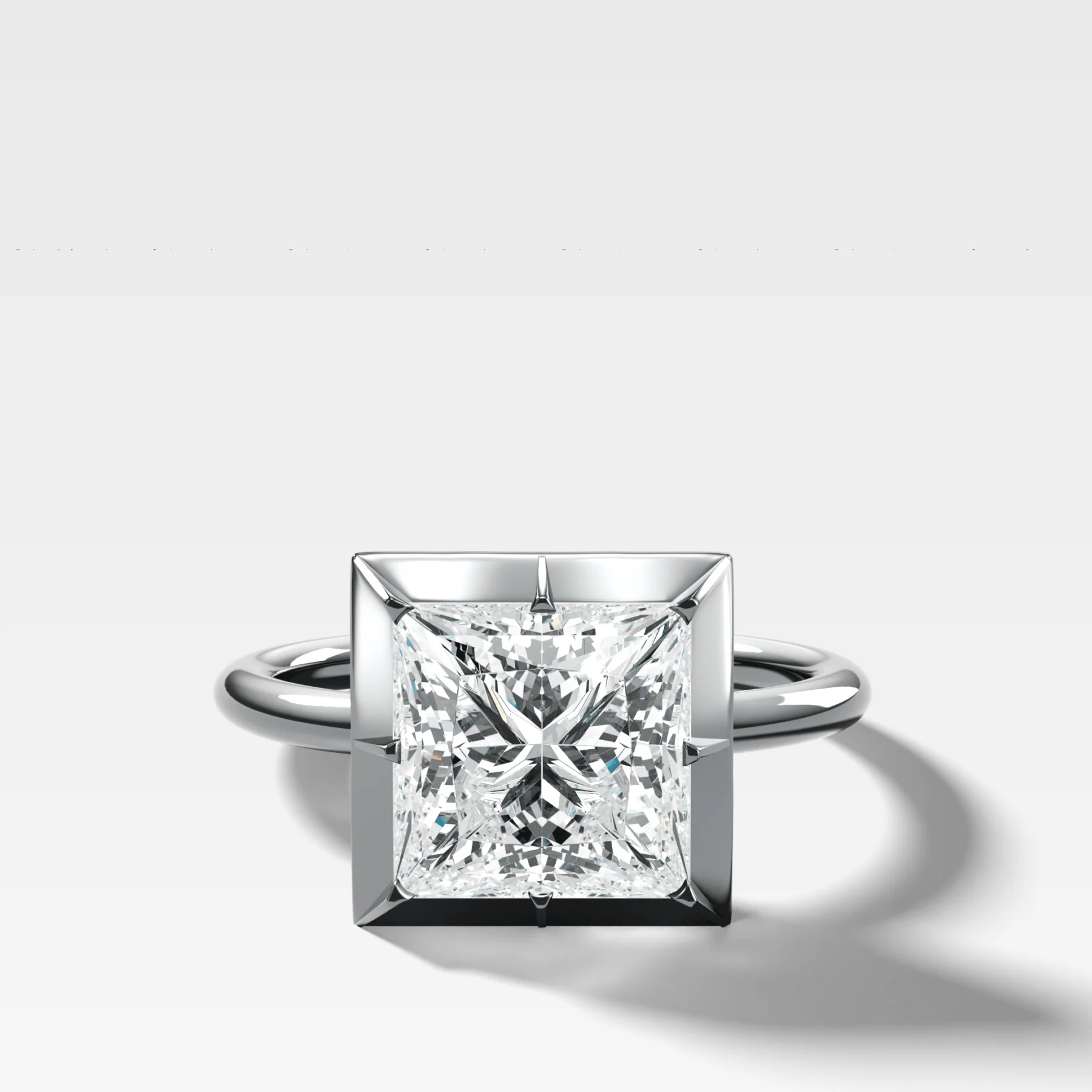 Button Back Solitaire Engagement Ring With a Princess Cut Diamond - Image 3
