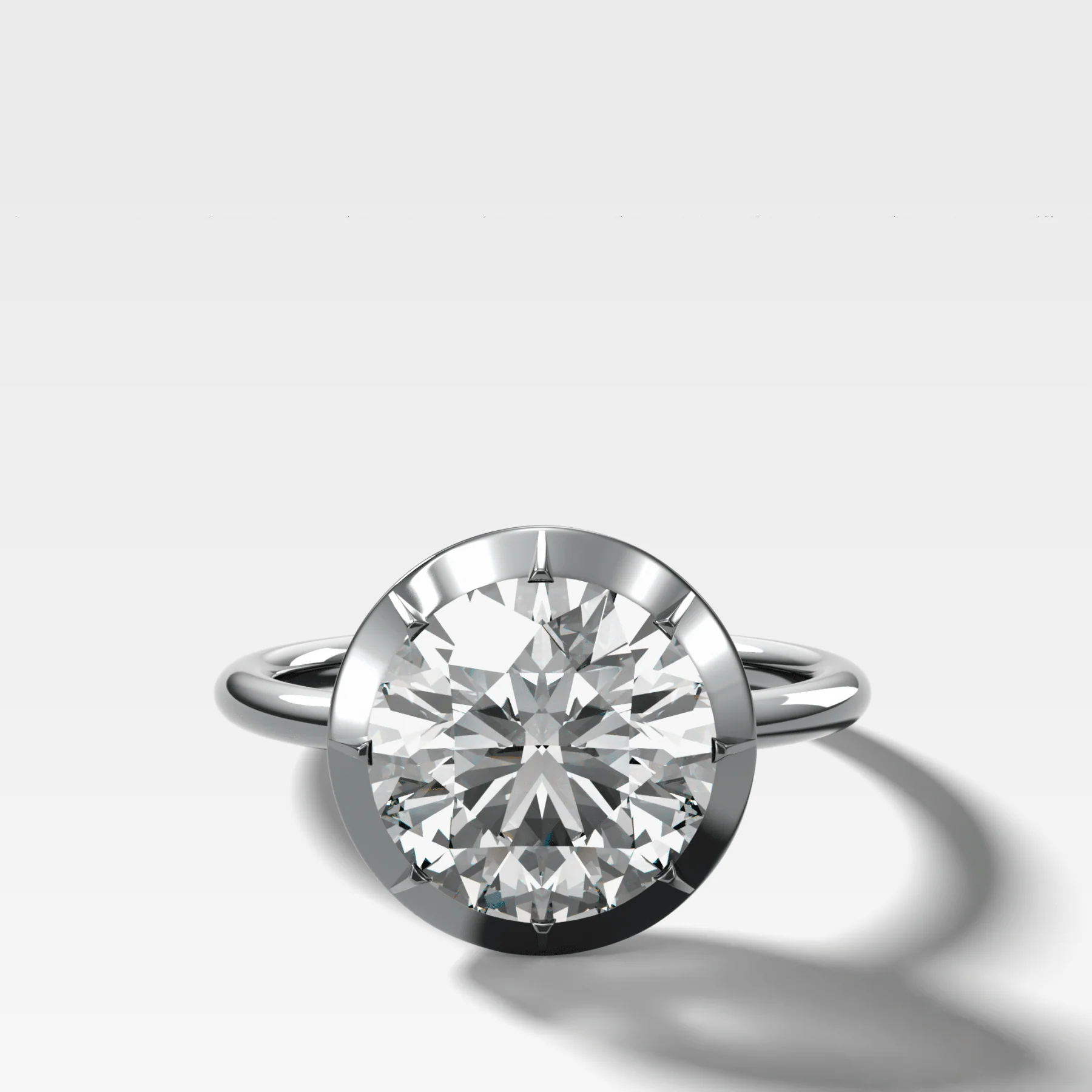 Button Back Solitaire Engagement Ring With a Round Cut Diamond - Image 3