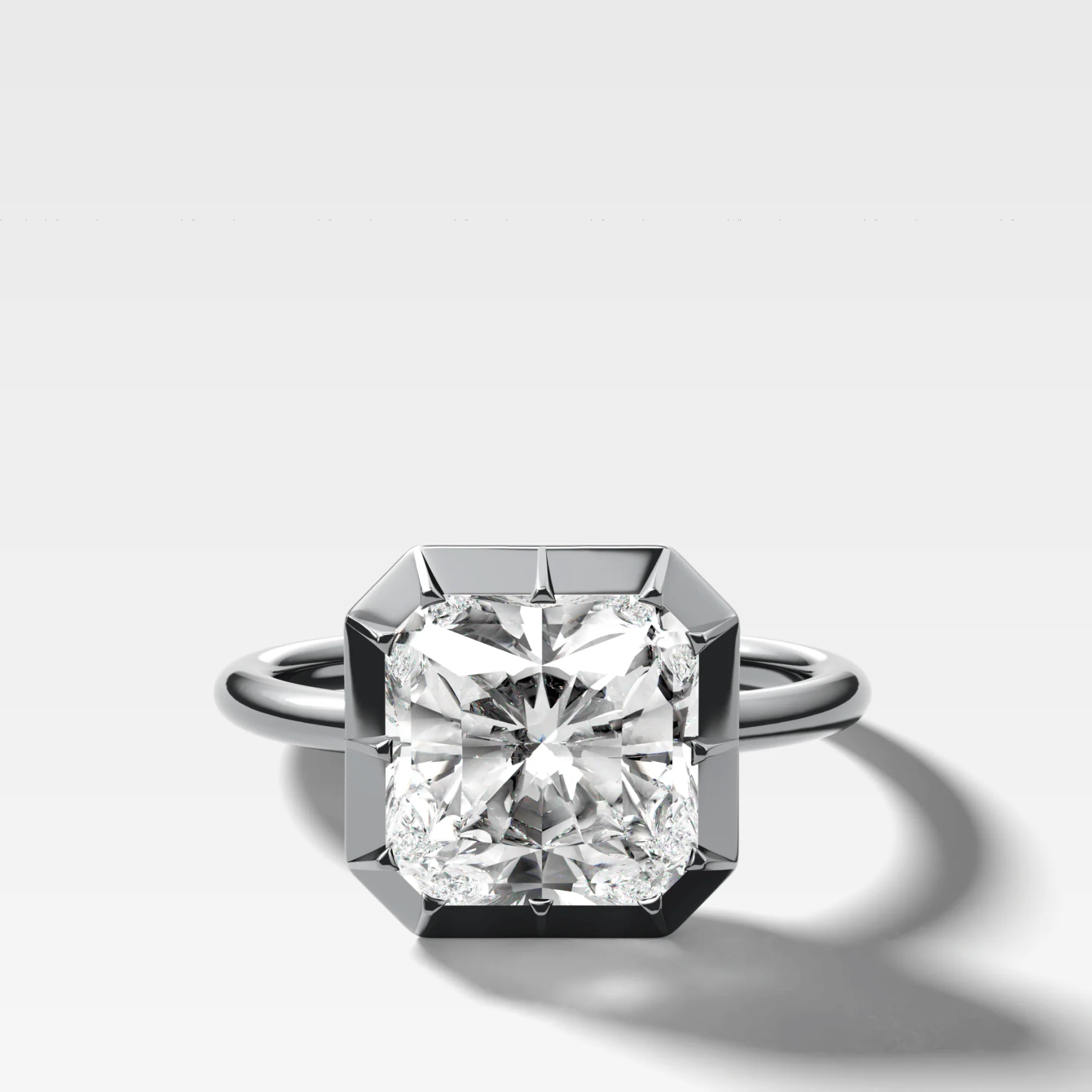 Button Back Solitaire Engagement Ring With a Square Radiant Cut Diamond - Image 3