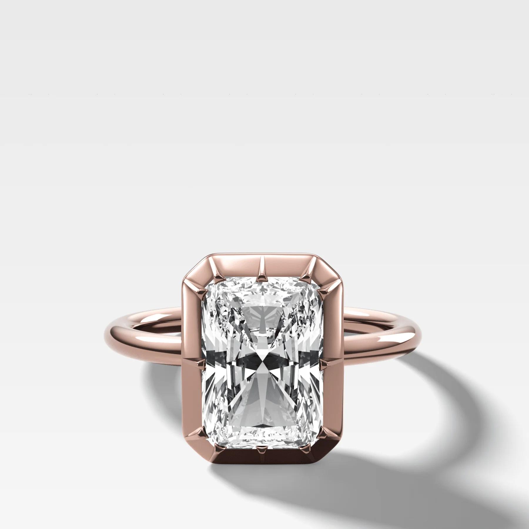 Button Back Solitaire Engagement Ring With an Elongated Radiant Cut Diamond - Image 4