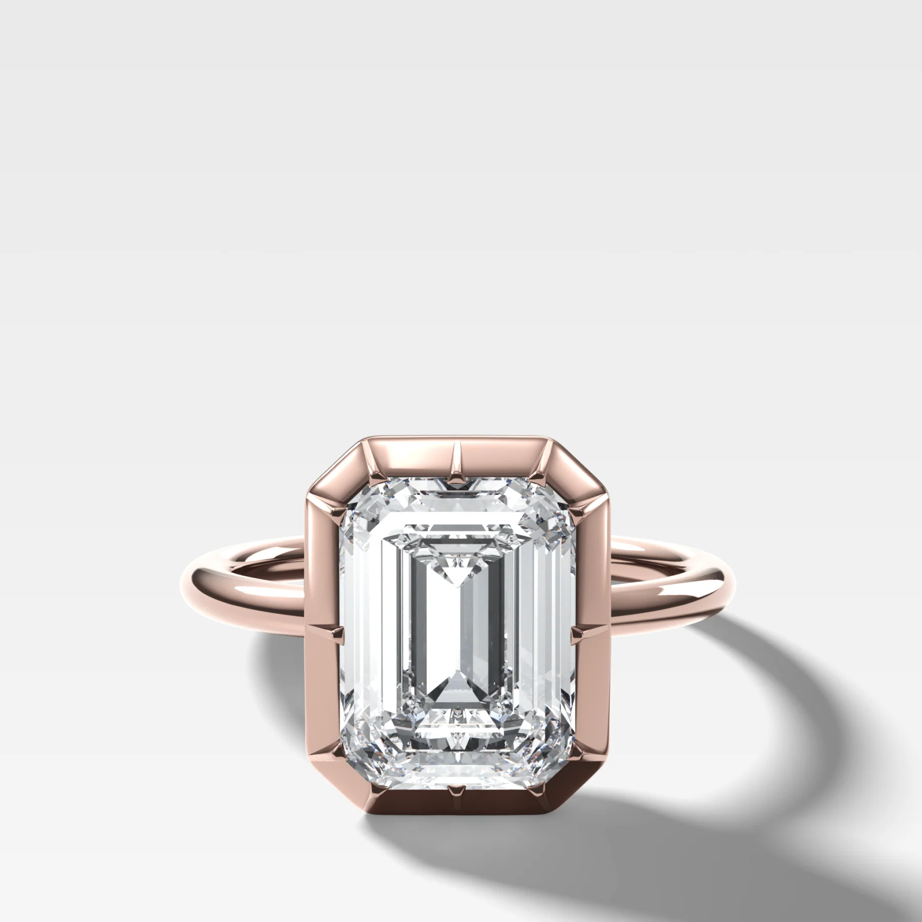 Button Back Solitaire Engagement Ring With an Emerald Cut Diamond - Image 4
