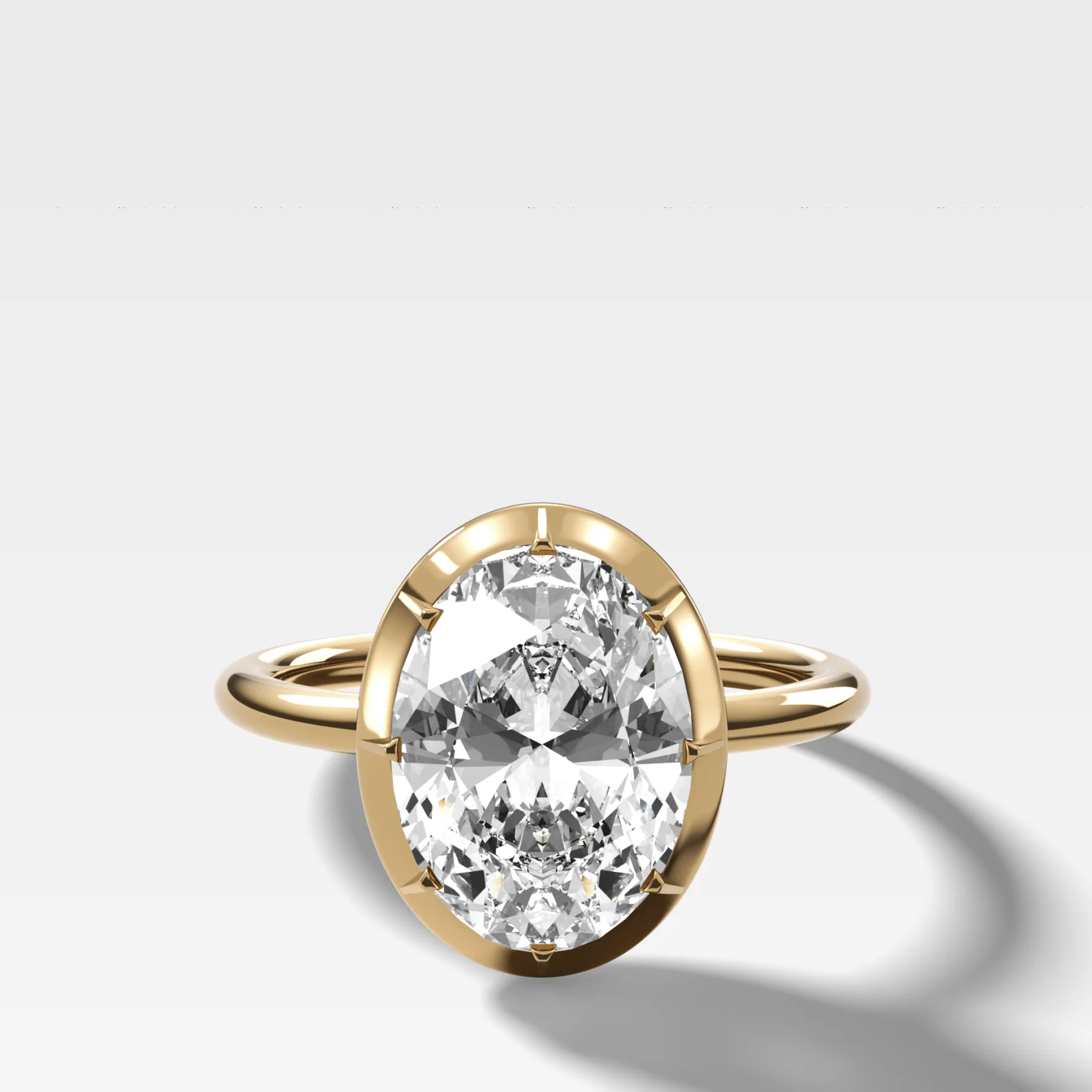 Button Back Solitaire Engagement Ring With an Oval Cut Diamond