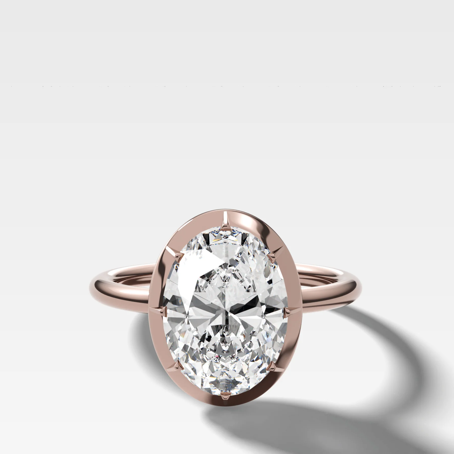 Button Back Solitaire Engagement Ring With an Oval Cut Diamond - Image 4
