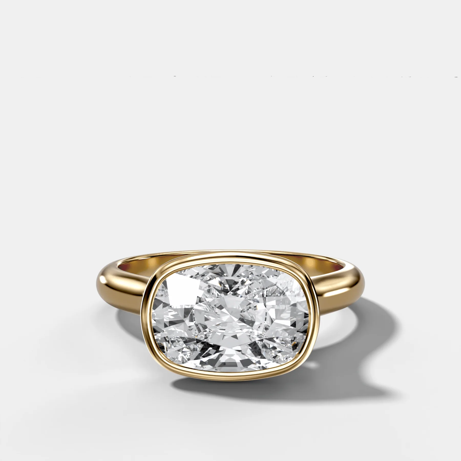 Cathedral Bezel Set Solitaire Engagement Ring With Elongated Cushion Diamond (East West)