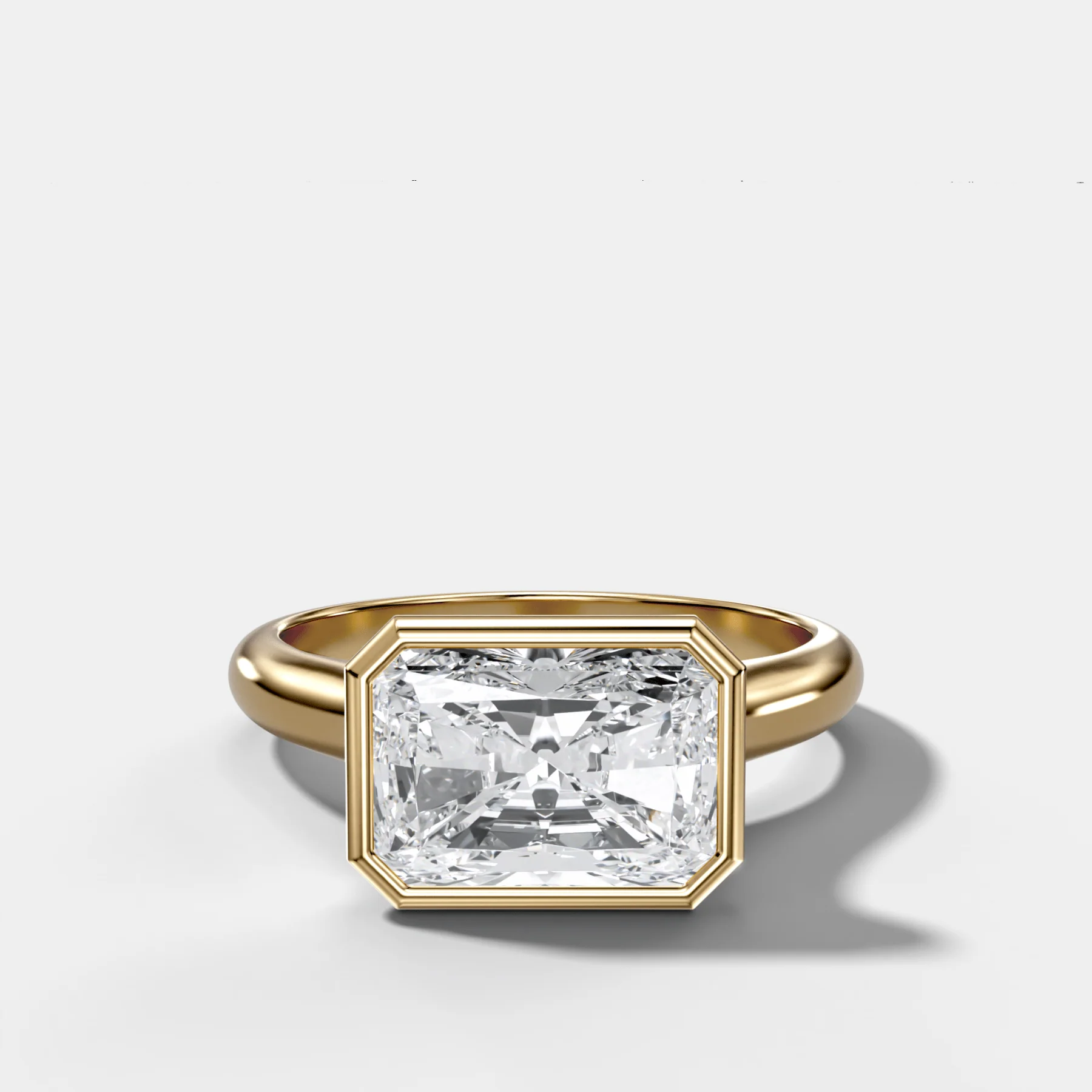 Cathedral Bezel Set Solitaire Engagement Ring With Elongated Radiant Diamond (East West)