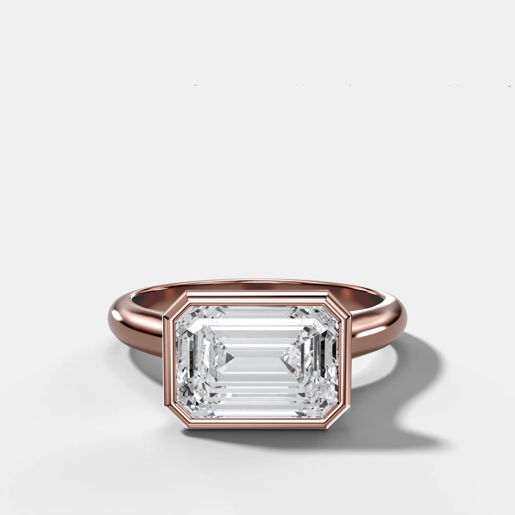 Cathedral Bezel Set Solitaire Engagement Ring With Emerald Cut Diamond (East West) - Image 4