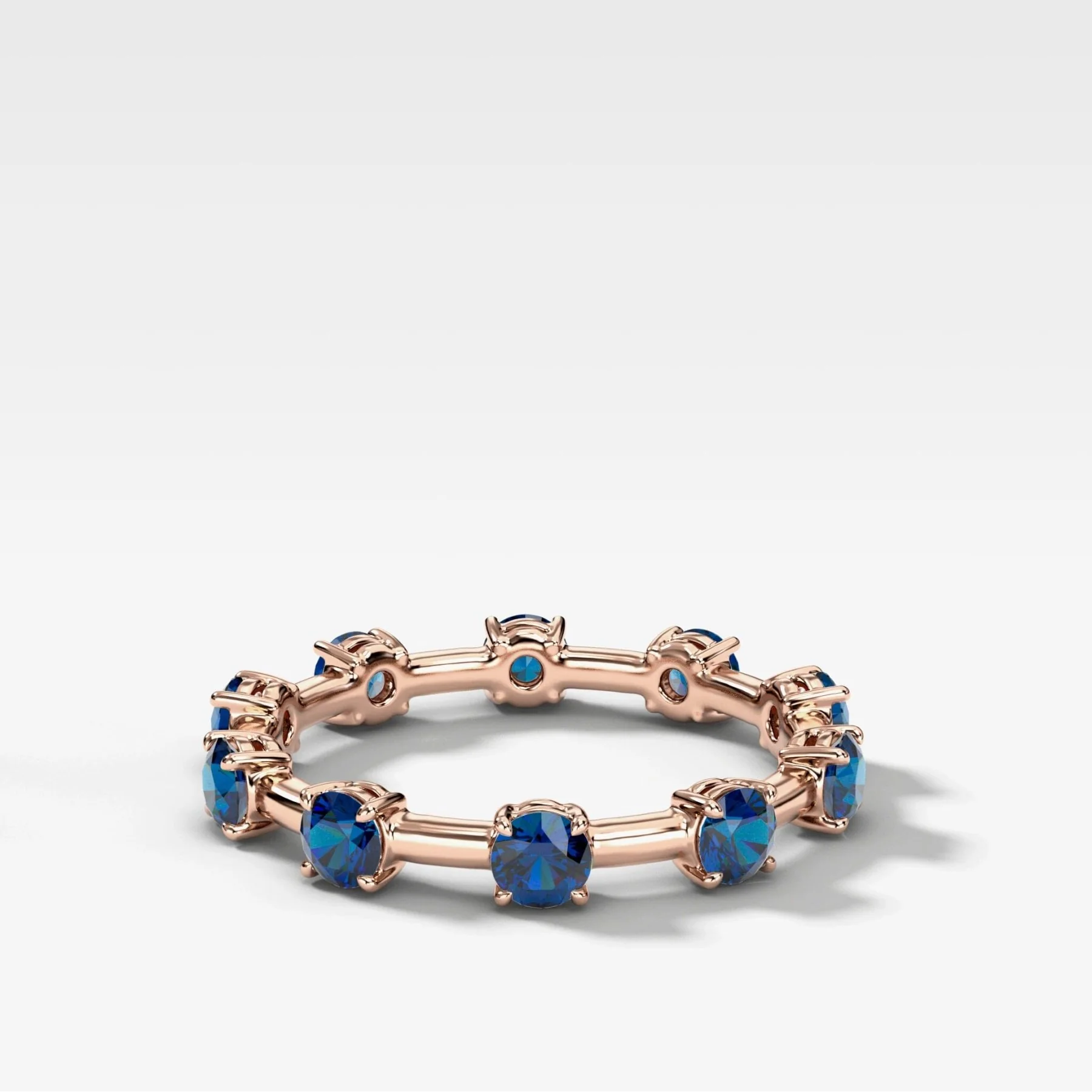 Claw Diamond Band: Jumbo Spaced Eternity Band with Blue Sapphire - Image 2