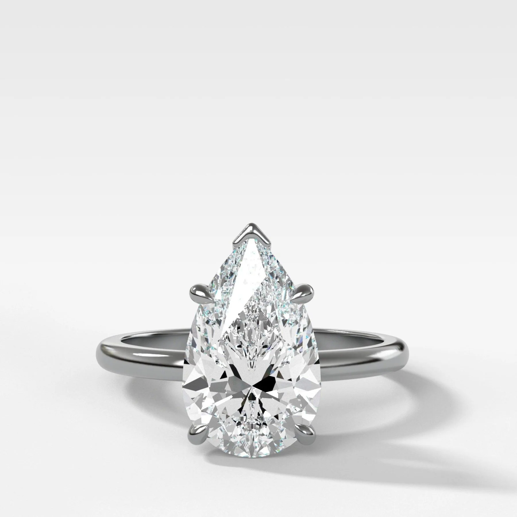 Crescent Solitaire Engagement Ring With Pear Cut Diamond - Image 3