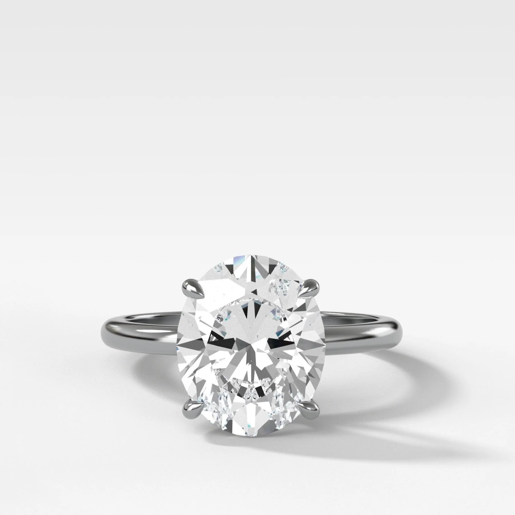 Crescent Solitaire Engagement Ring With Oval Cut Diamond - Image 4