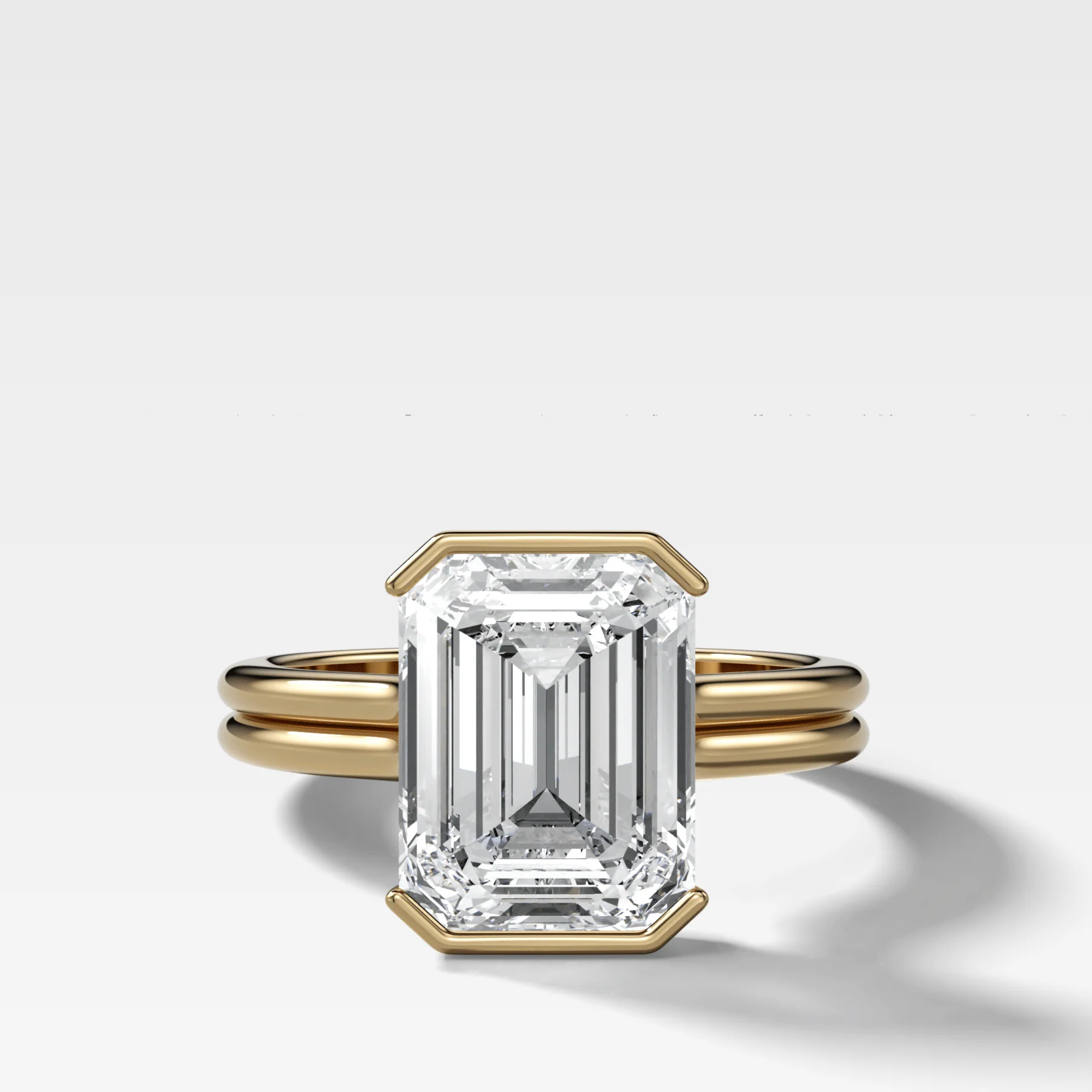Double Row Half Bezel Solitaire Engagement Ring With Emerald Cut Diamond