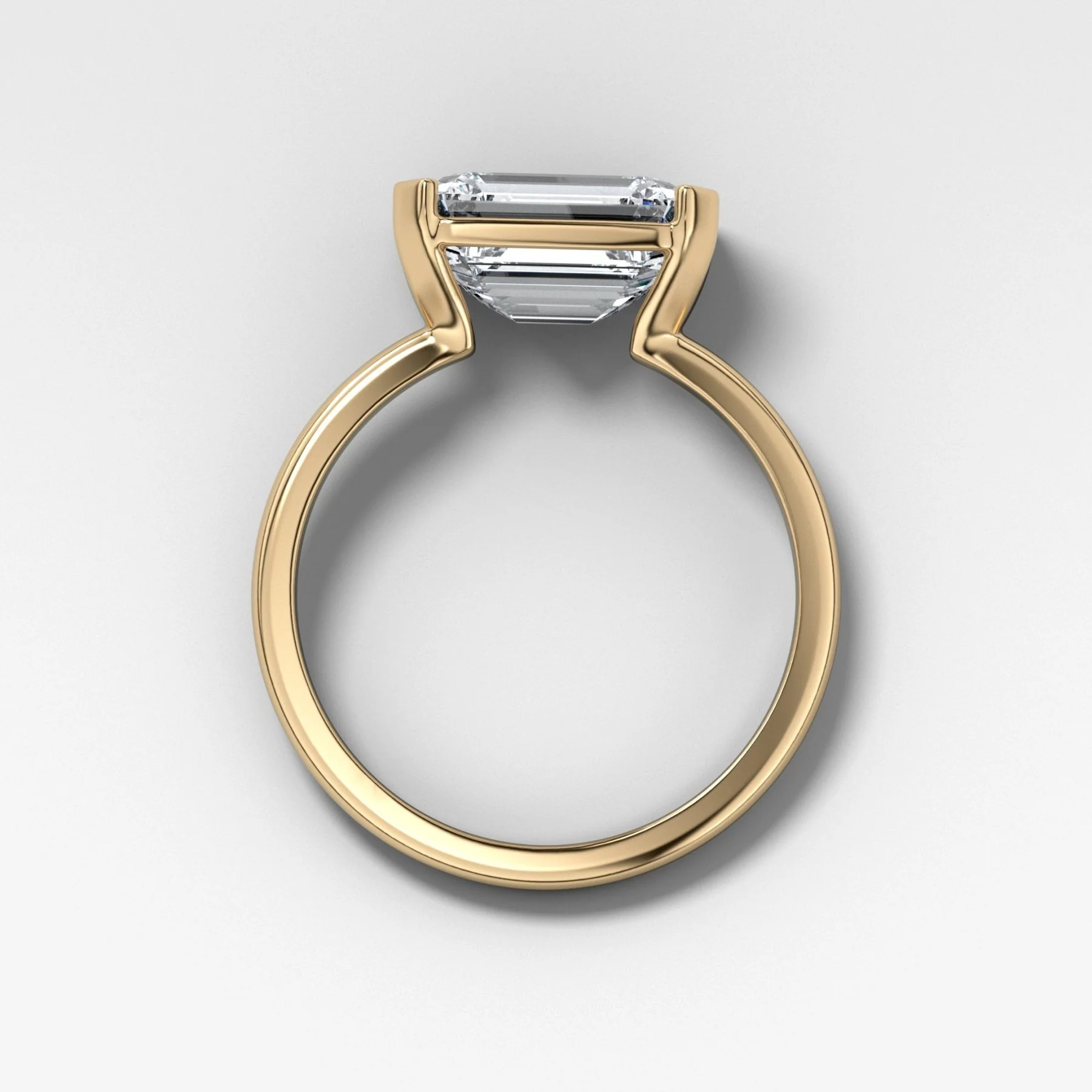 East West Half Bezel Solitaire Engagement Ring With Emerald Cut Diamond - Image 2