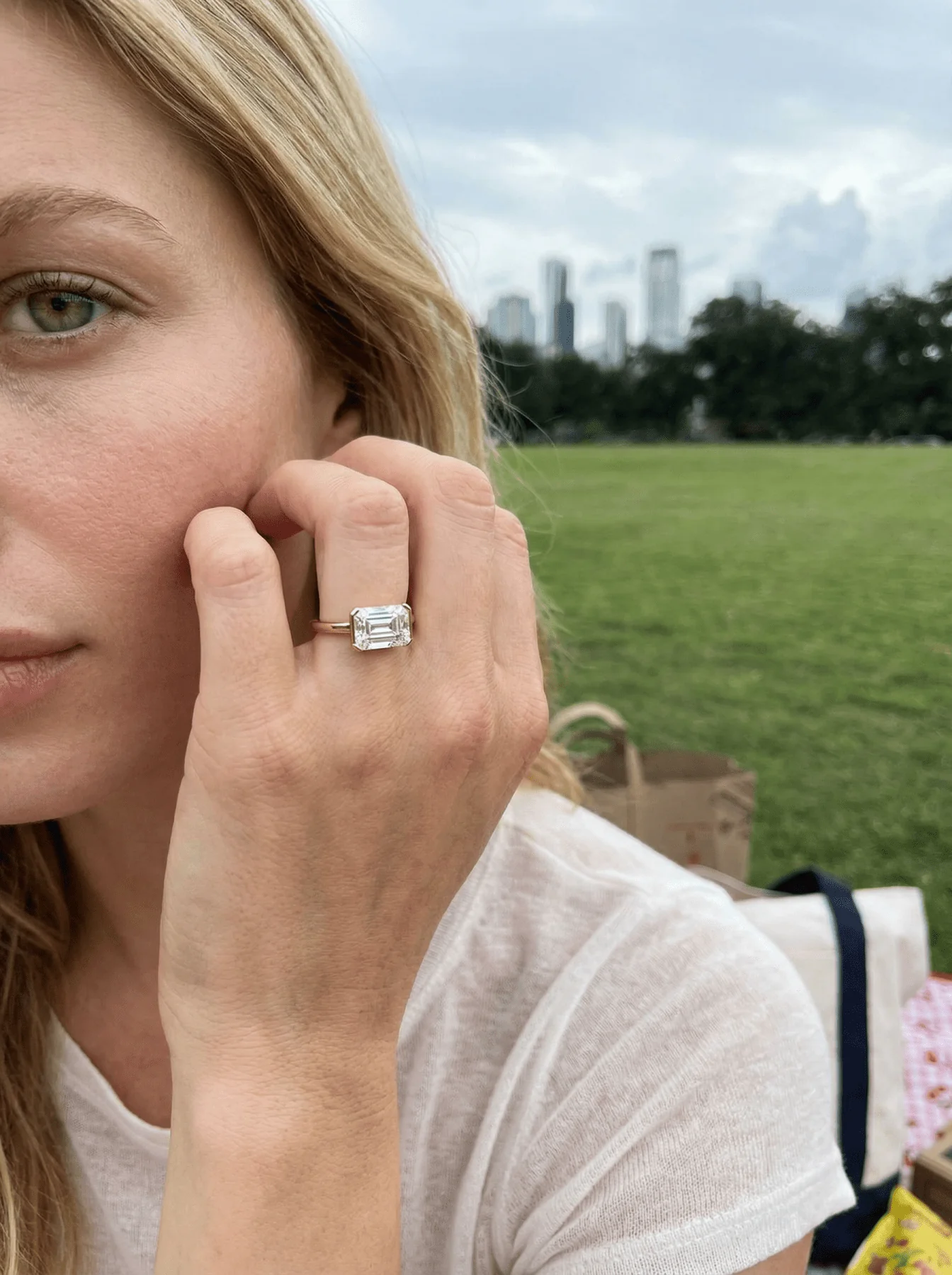 East West Half Bezel Solitaire Engagement Ring With Emerald Cut Diamond - Image 4
