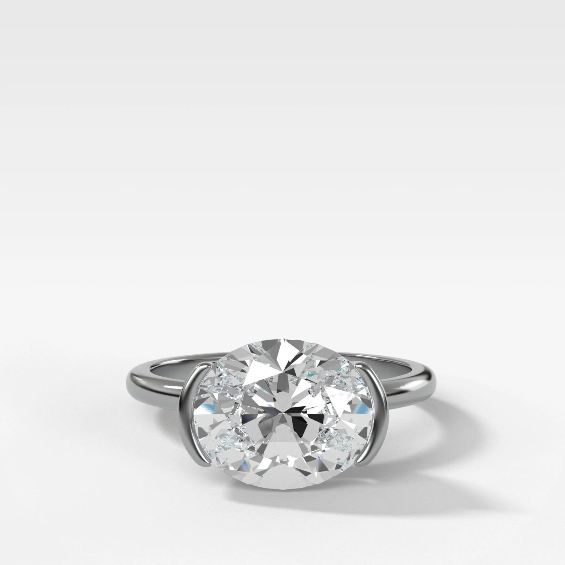 East West Half Bezel Solitaire Engagement Ring With Oval Cut Diamond - Image 7