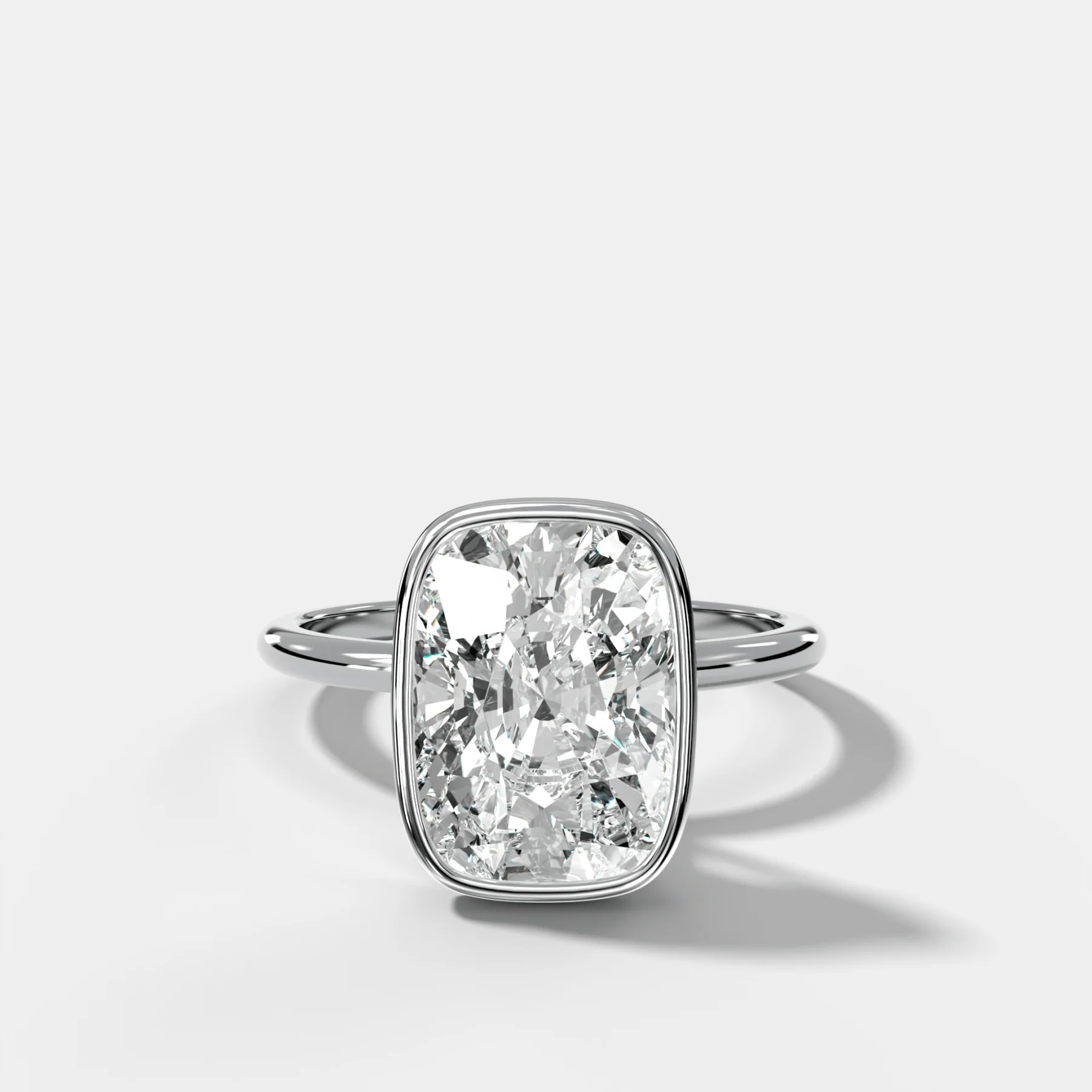 Penumbra Bezel Hidden Halo Engagement Ring with Elongated Cushion Cut - Image 3
