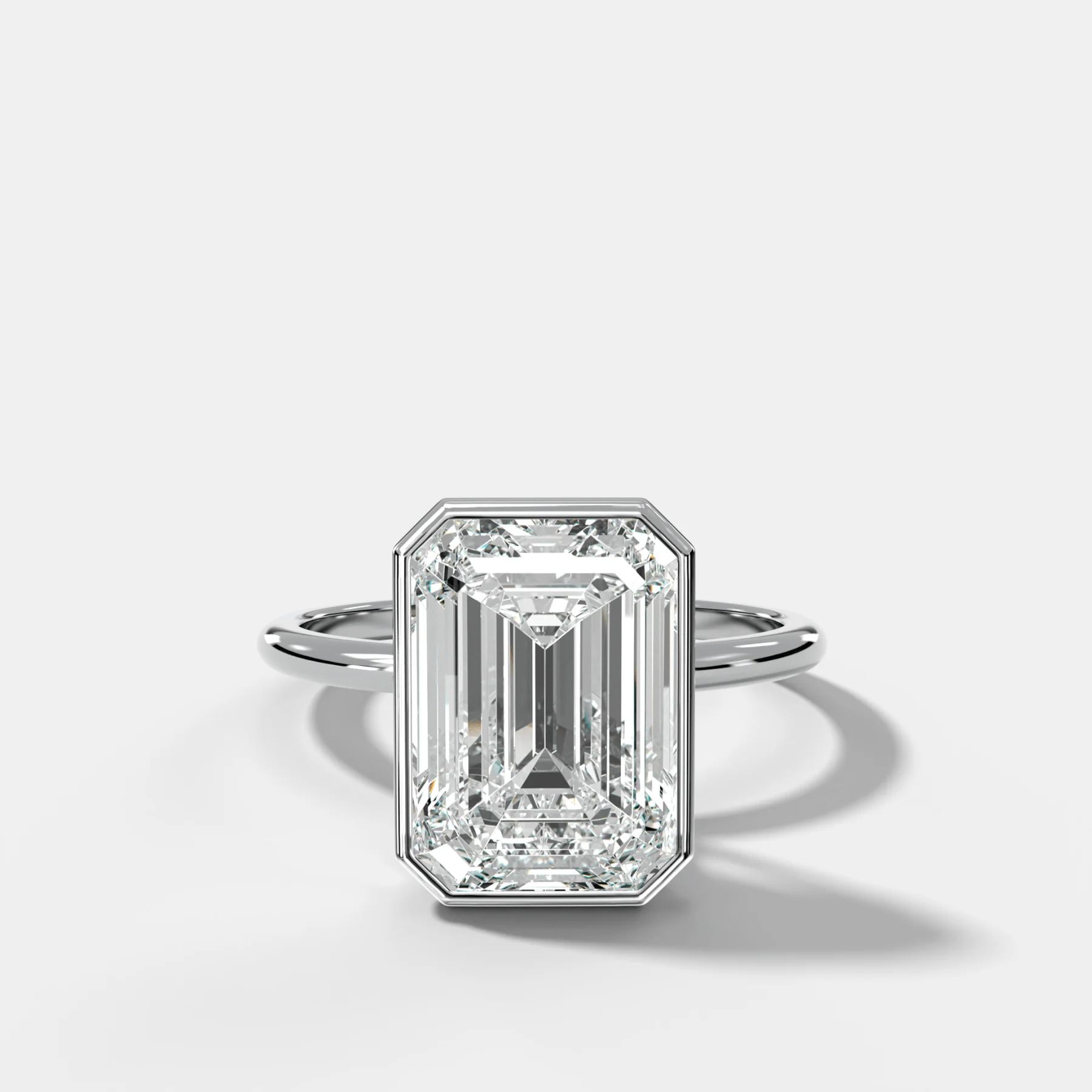 Penumbra Bezel Hidden Halo Engagement Ring with Emerald Cut - Image 3