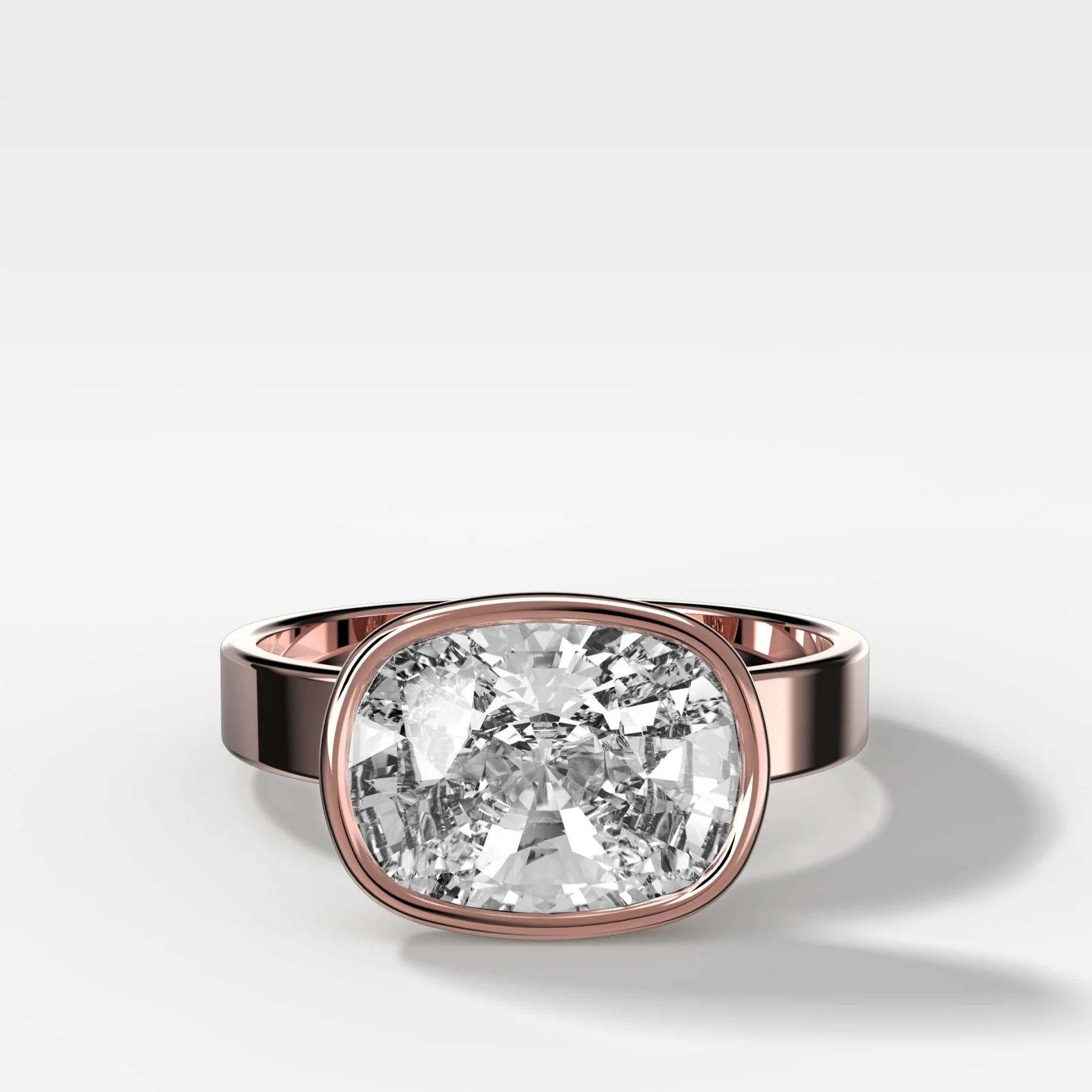 Finest Bezel Set Engagement Ring With East West Elongated Cushion Cut Diamond - Image 4