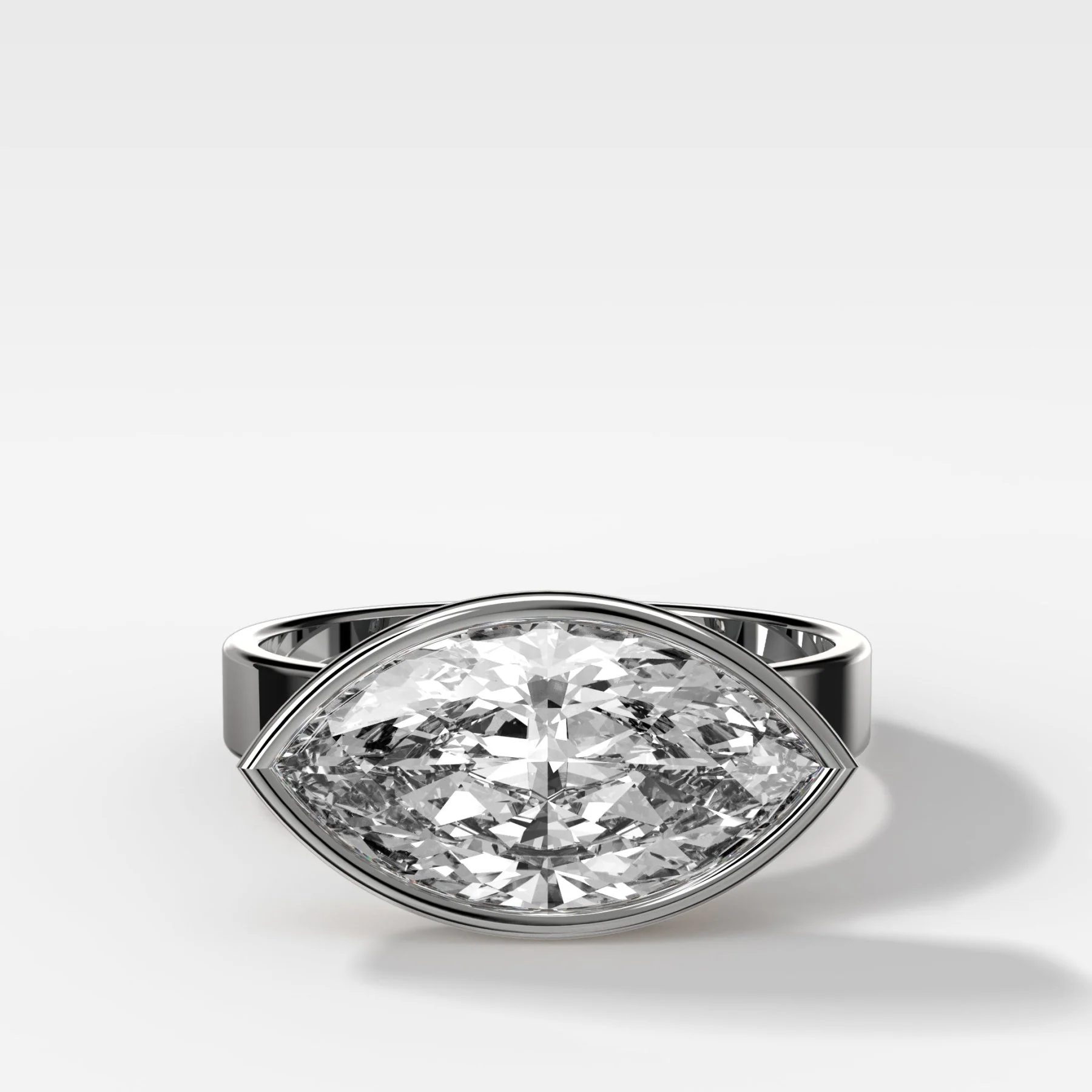 Finest Bezel Set Engagement Ring With East West Marquise Cut Diamond - Image 3