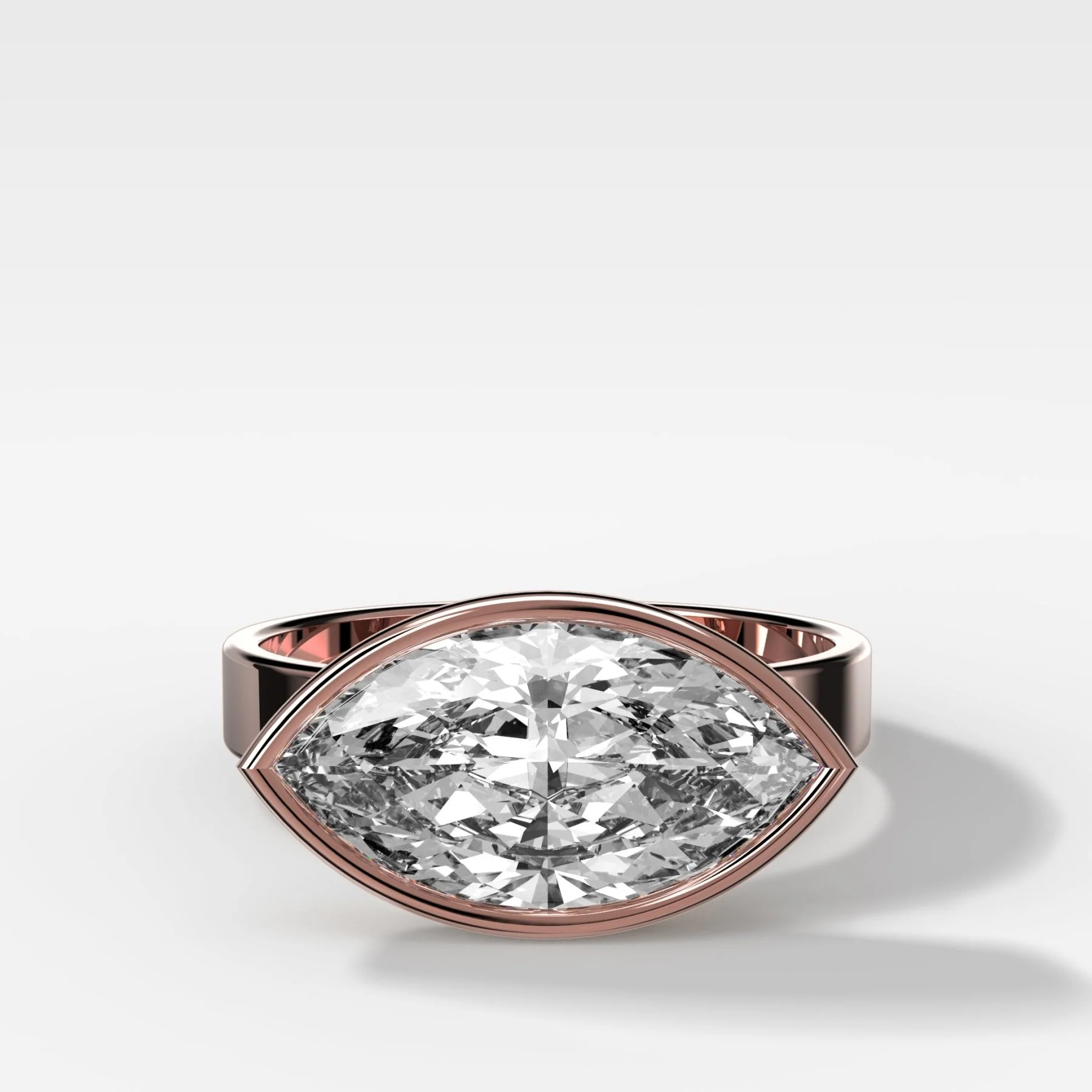 Finest Bezel Set Engagement Ring With East West Marquise Cut Diamond - Image 4
