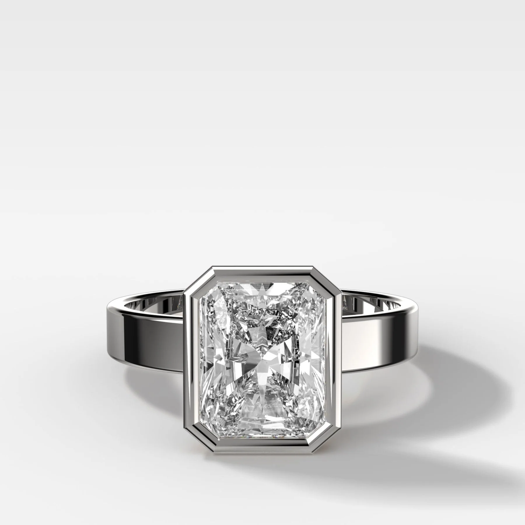 Finest Bezel Set Engagement Ring With Elongated Radiant Cut Diamond - Image 3