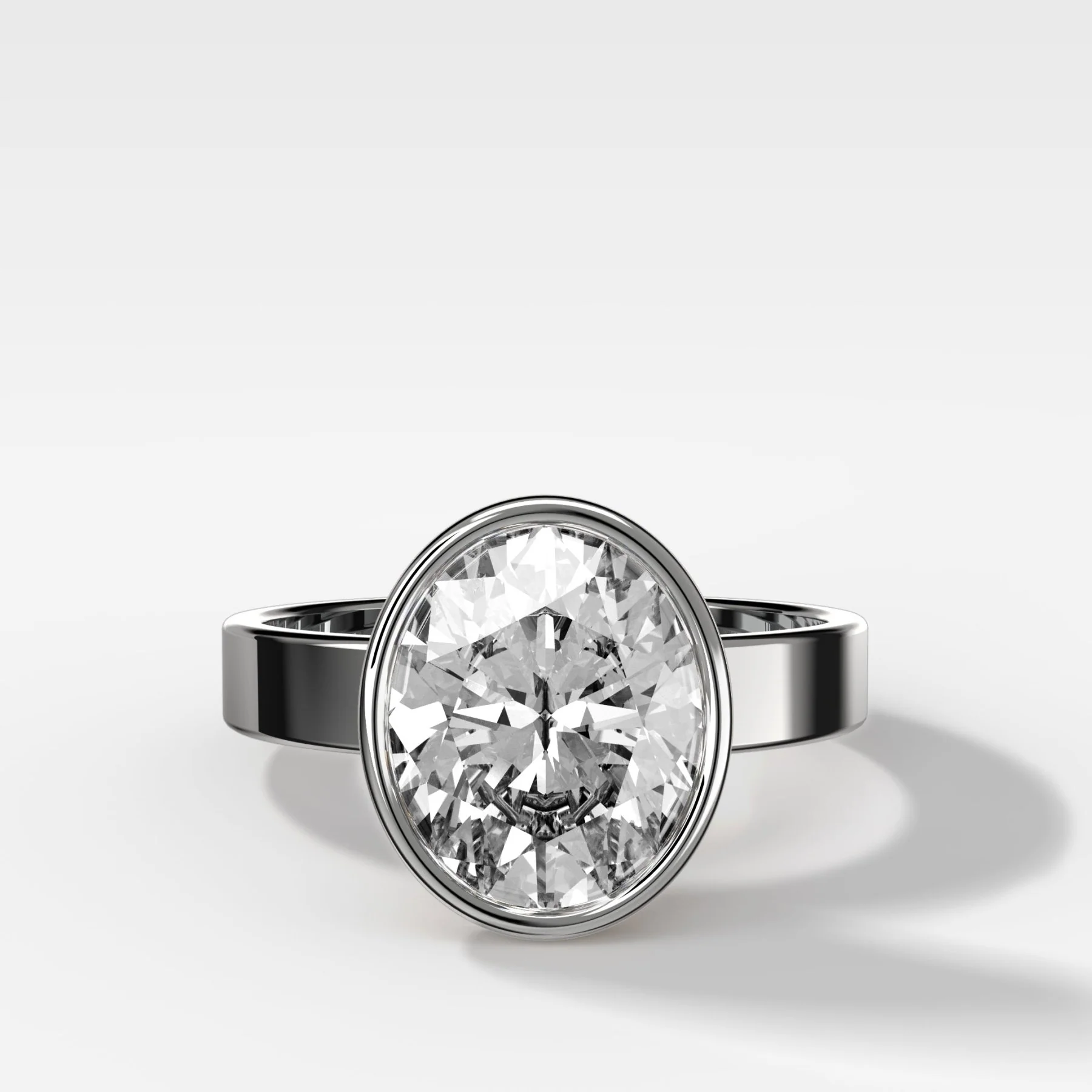 Finest Bezel Set Engagement Ring With Oval Cut Diamond - Image 3