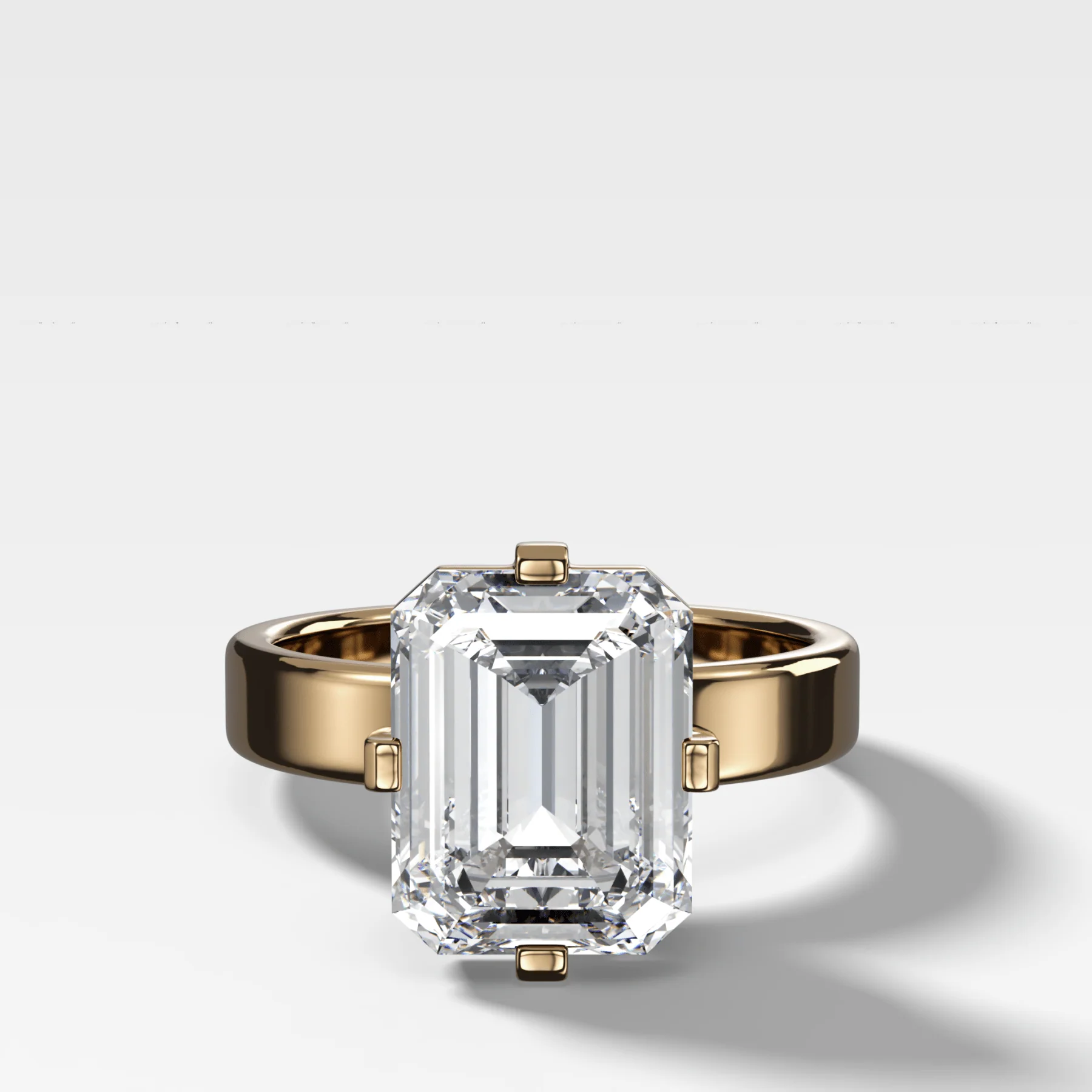 Finest Compass Solitaire Engagement Ring with Emerald Cut Diamond