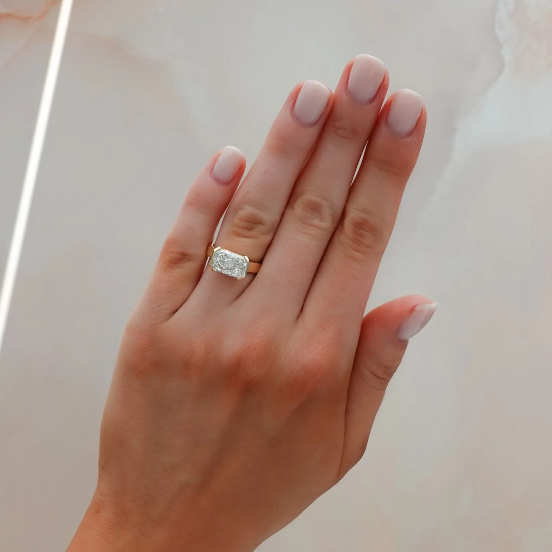 Finest Half Bezel Solitaire Engagement Ring With East West Elongated Radiant Cut Diamond - Image 3