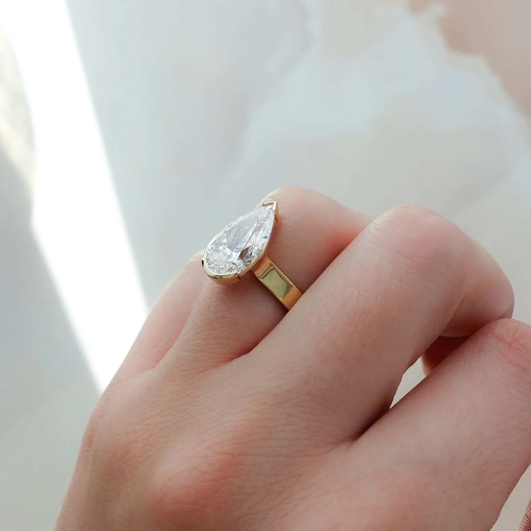Finest Half Bezel Solitaire Engagement Ring With Pear Cut Diamond - Image 6