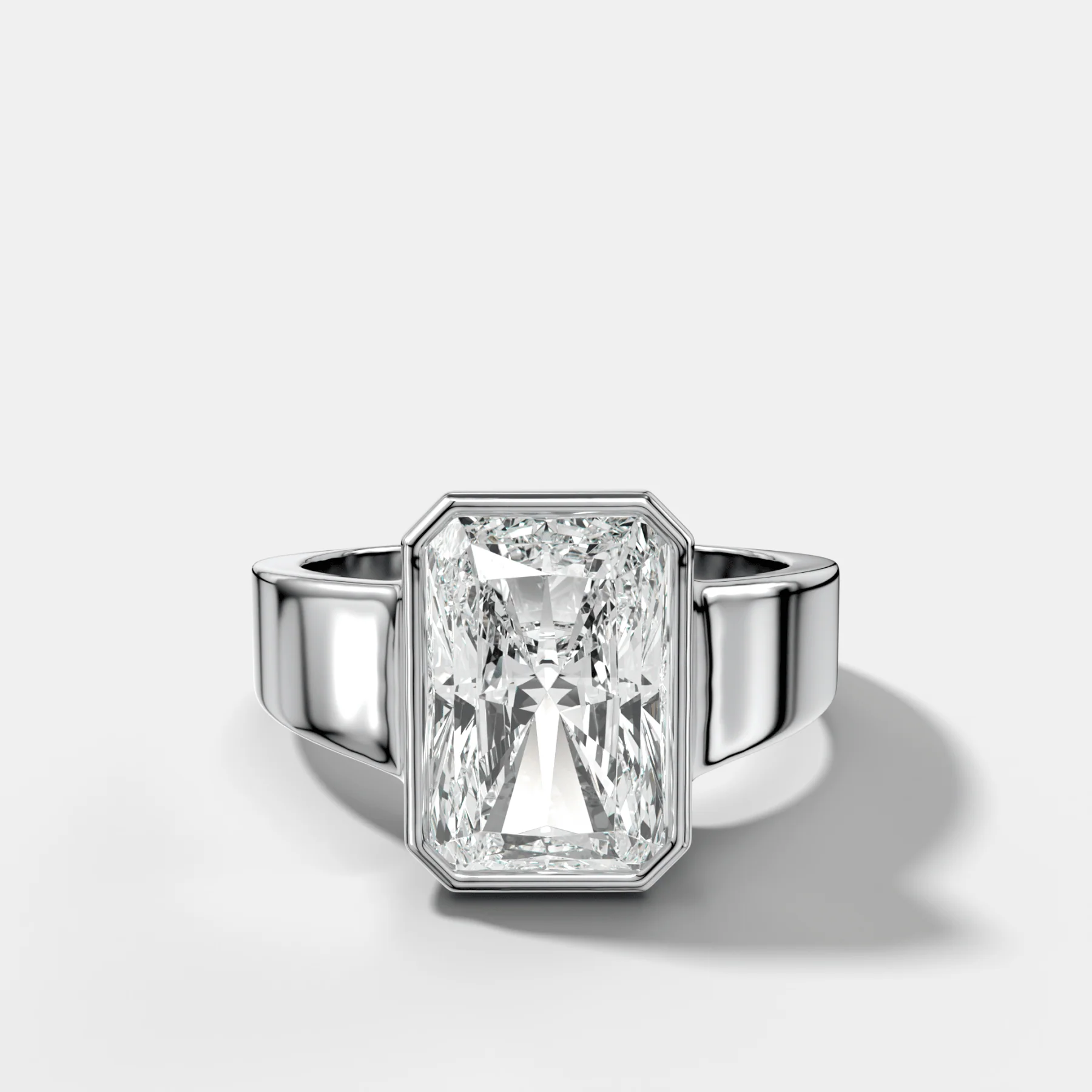 Finest Tapered Bezel Set Engagement Ring With Elongated Radiant Cut Diamond - Image 3