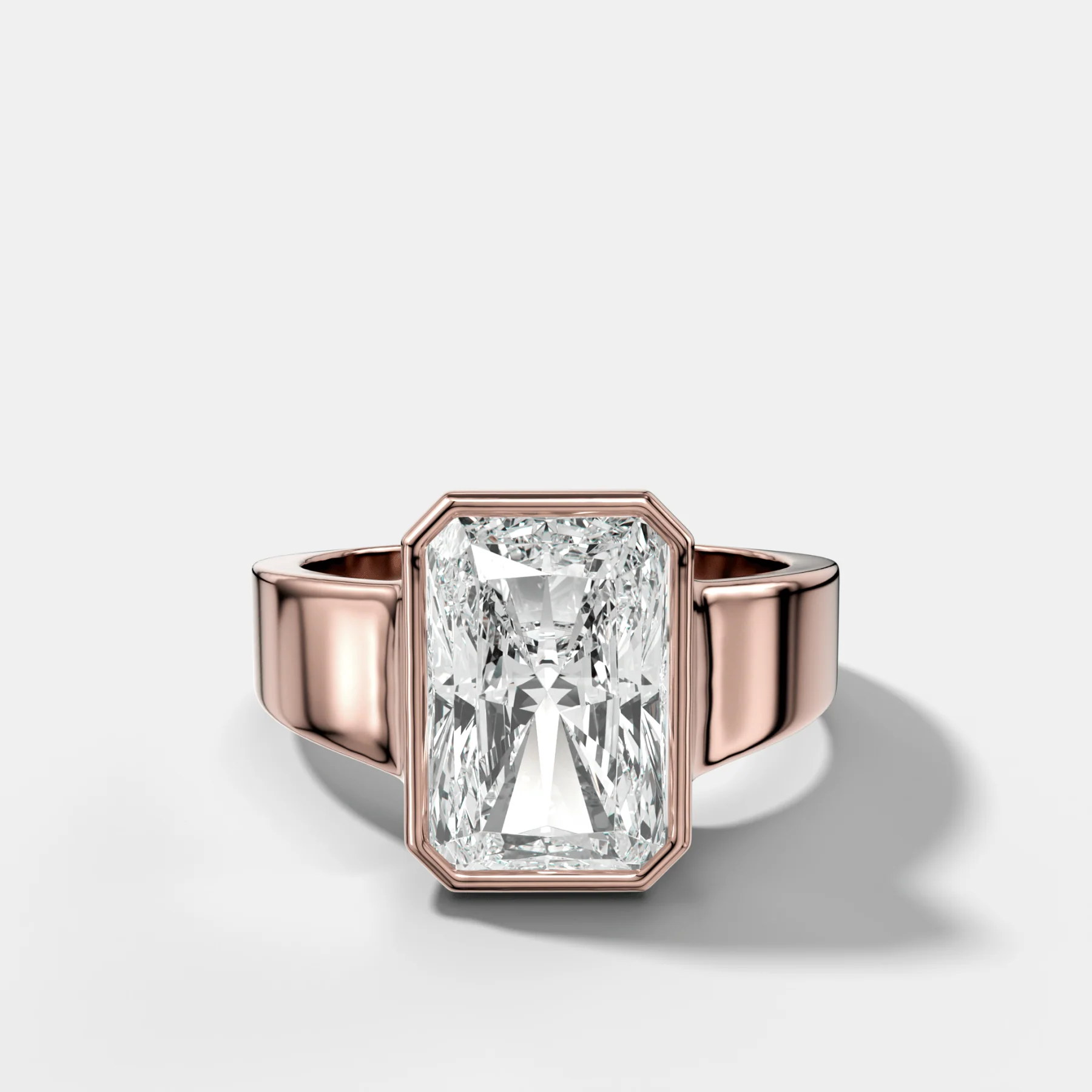 Finest Tapered Bezel Set Engagement Ring With Elongated Radiant Cut Diamond - Image 4