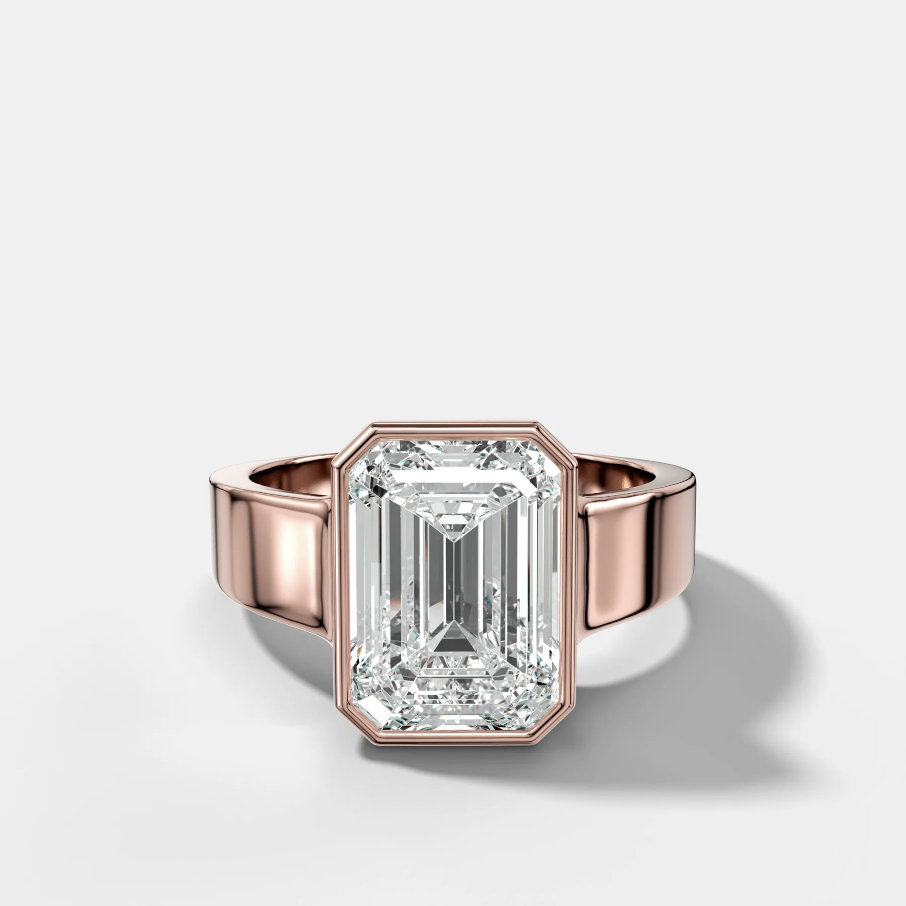 Finest Tapered Bezel Set Engagement Ring With Emerald Cut Diamond - Image 4