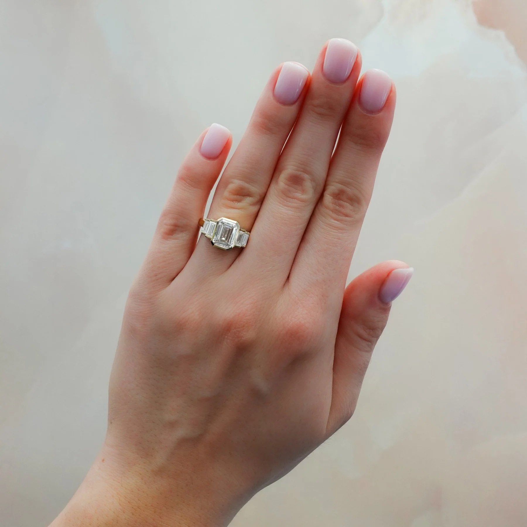 Five Stone Engagement Ring with Half Bezel Baguette Side Stones and Bezel Set Emerald Cut Diamond - Image 7