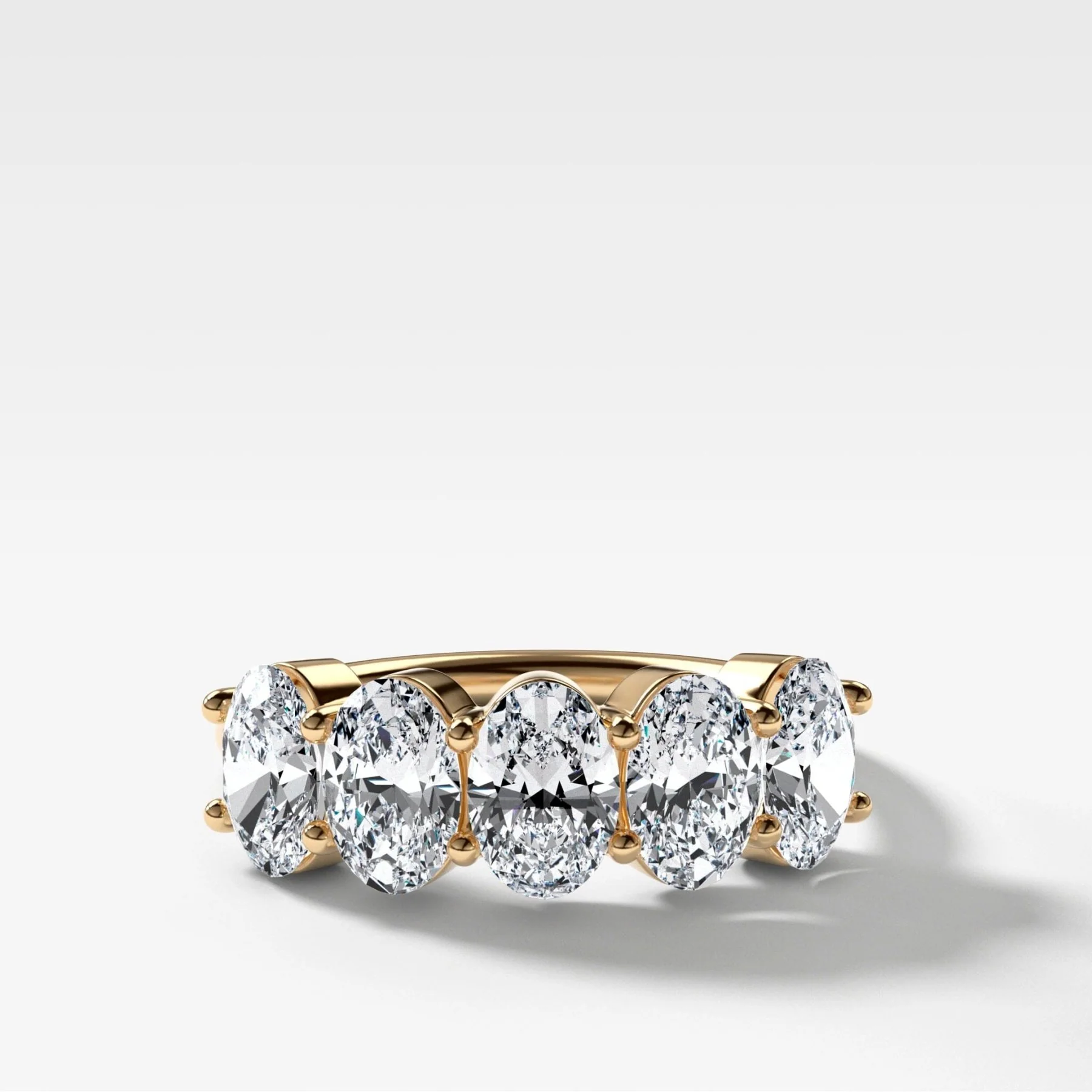 Five Stone Shared Prong Diamond Wedding Band With Oval Cuts (2.50ctw)